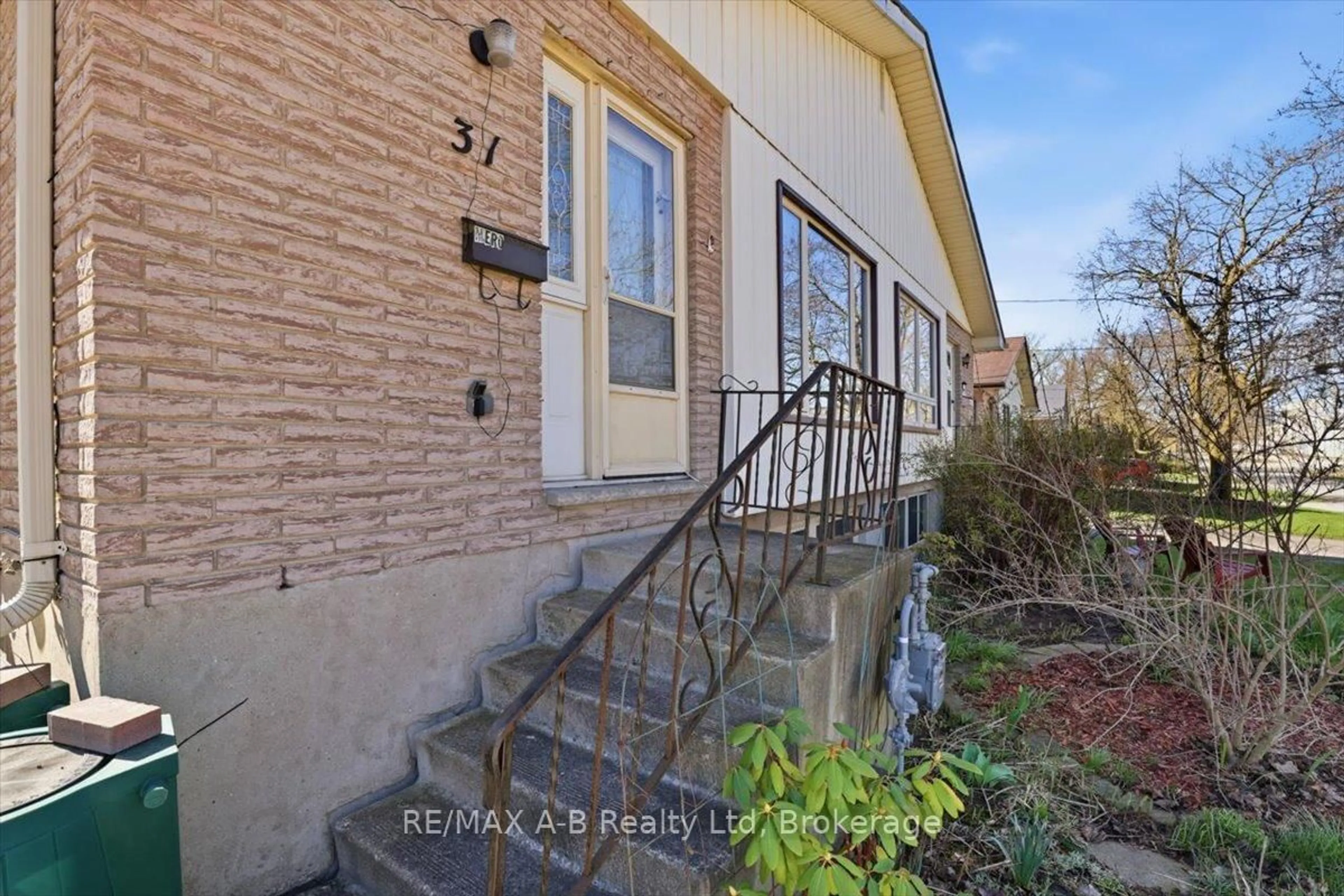 Home with brick exterior material, street for 31 Cedar St, Stratford Ontario N5A 2M1