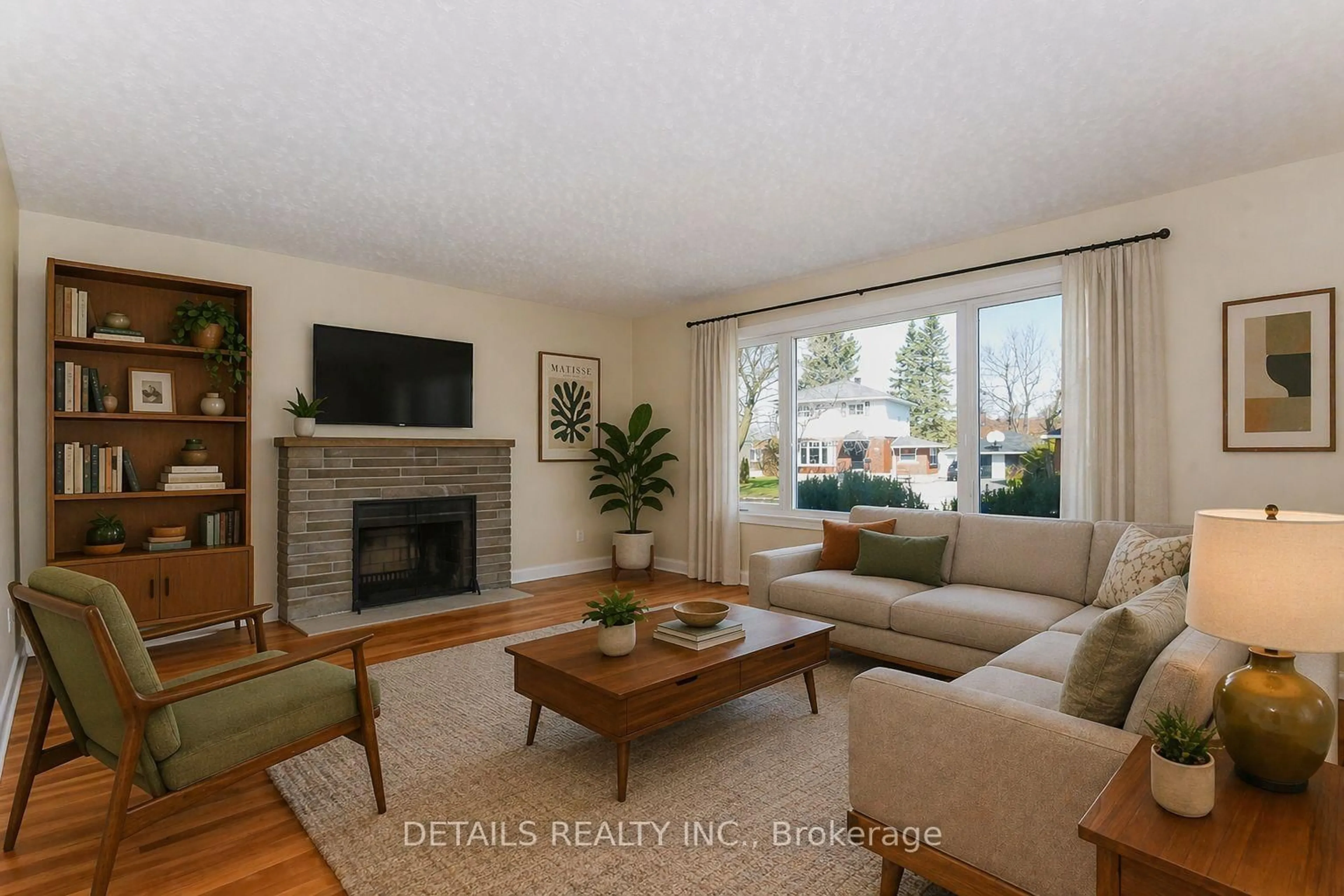 Living room with furniture, wood/laminate floor for 2364 Cheshire Rd, Ottawa Ontario K2C 1G3