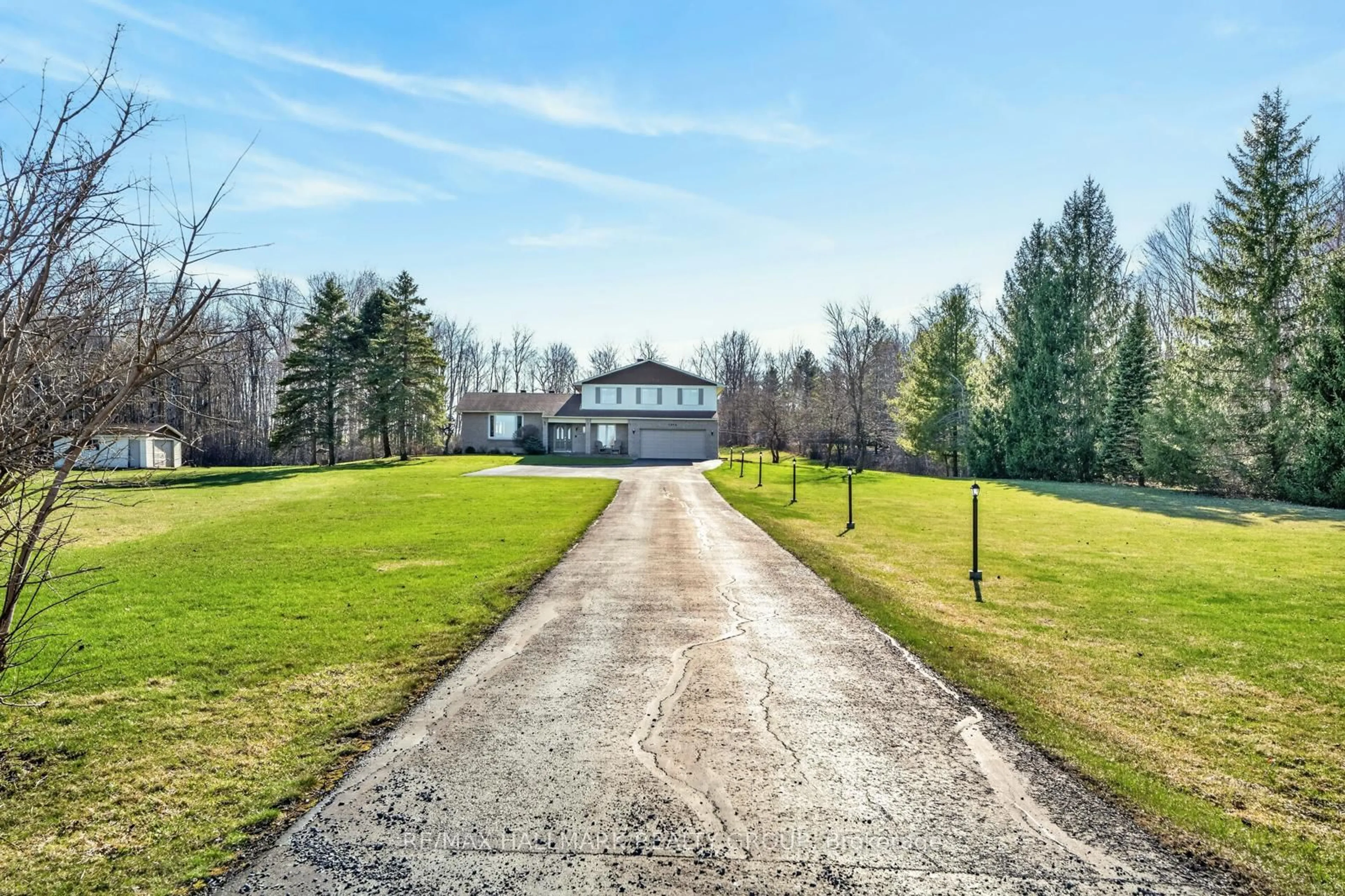 A pic from outside/outdoor area/front of a property/back of a property/a pic from drone, street for 1376 MacDonald Rd, Russell Ontario K4R 0K1