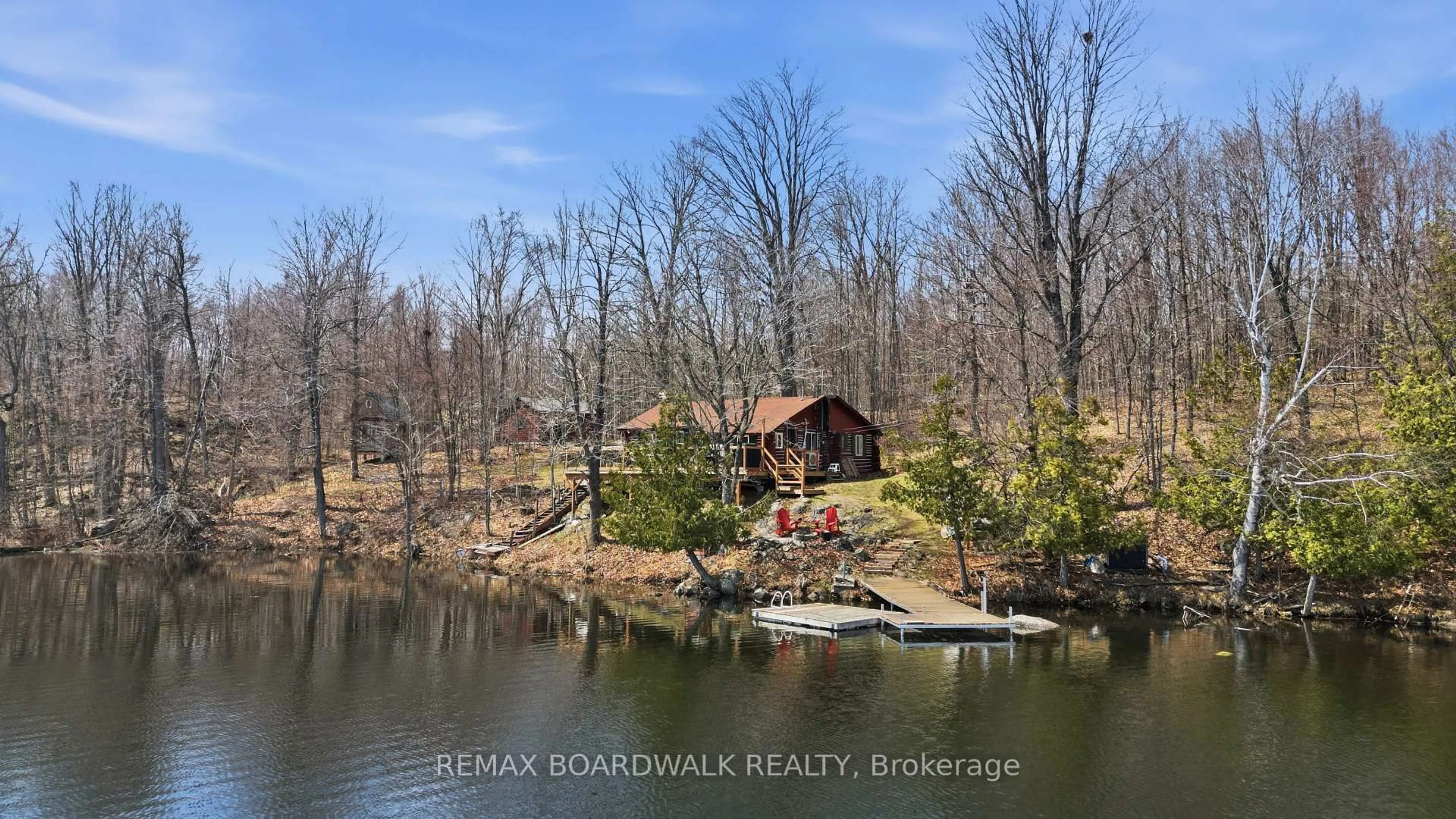 A pic from outside/outdoor area/front of a property/back of a property/a pic from drone, water/lake/river/ocean view for 5039 Bula Lane, Perth Ontario K7H 3C7