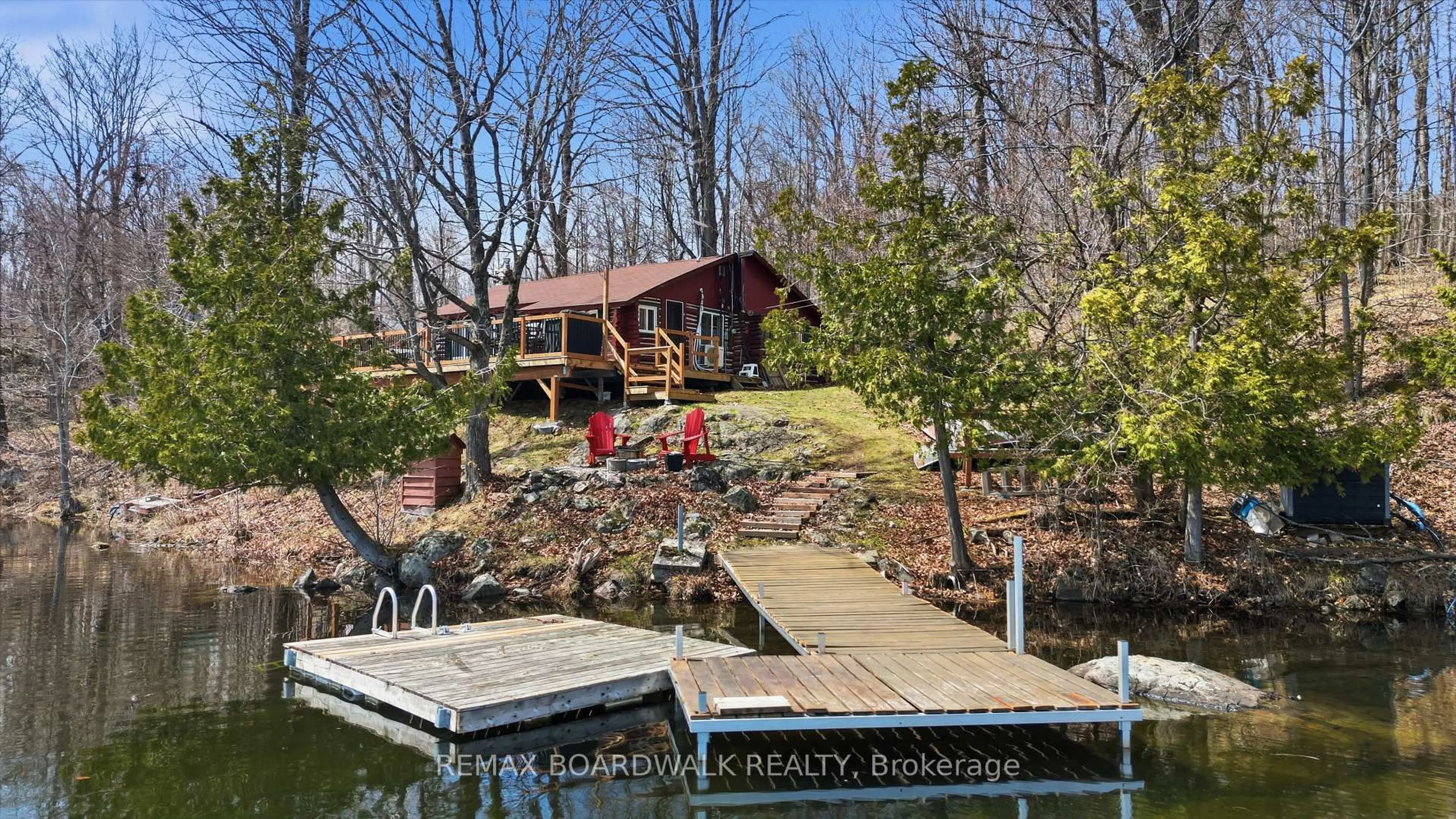 A pic from outside/outdoor area/front of a property/back of a property/a pic from drone, water/lake/river/ocean view for 5039 Bula Lane, Perth Ontario K7H 3C7