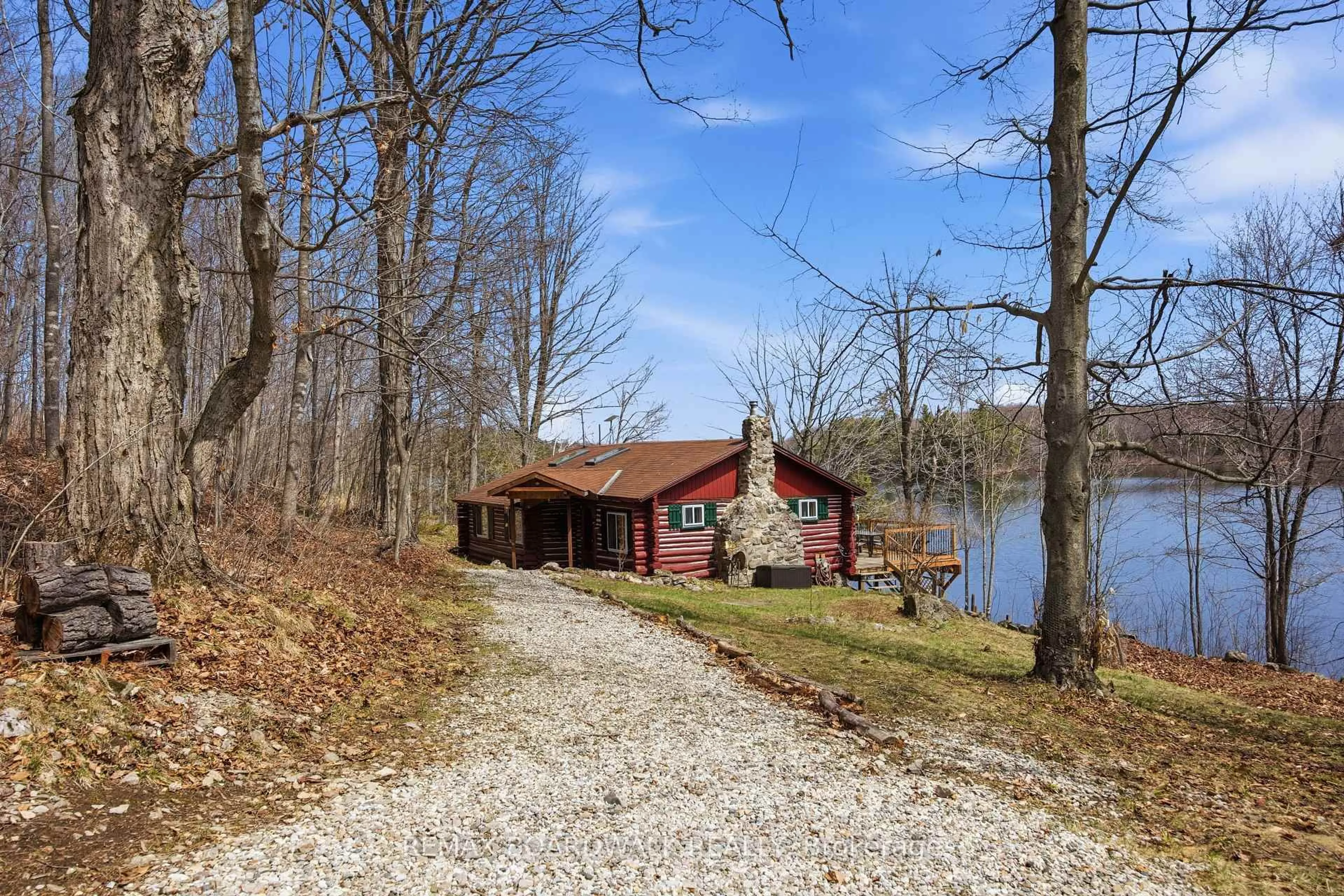 A pic from outside/outdoor area/front of a property/back of a property/a pic from drone, water/lake/river/ocean view for 5039 Bula Lane, Perth Ontario K7H 3C7