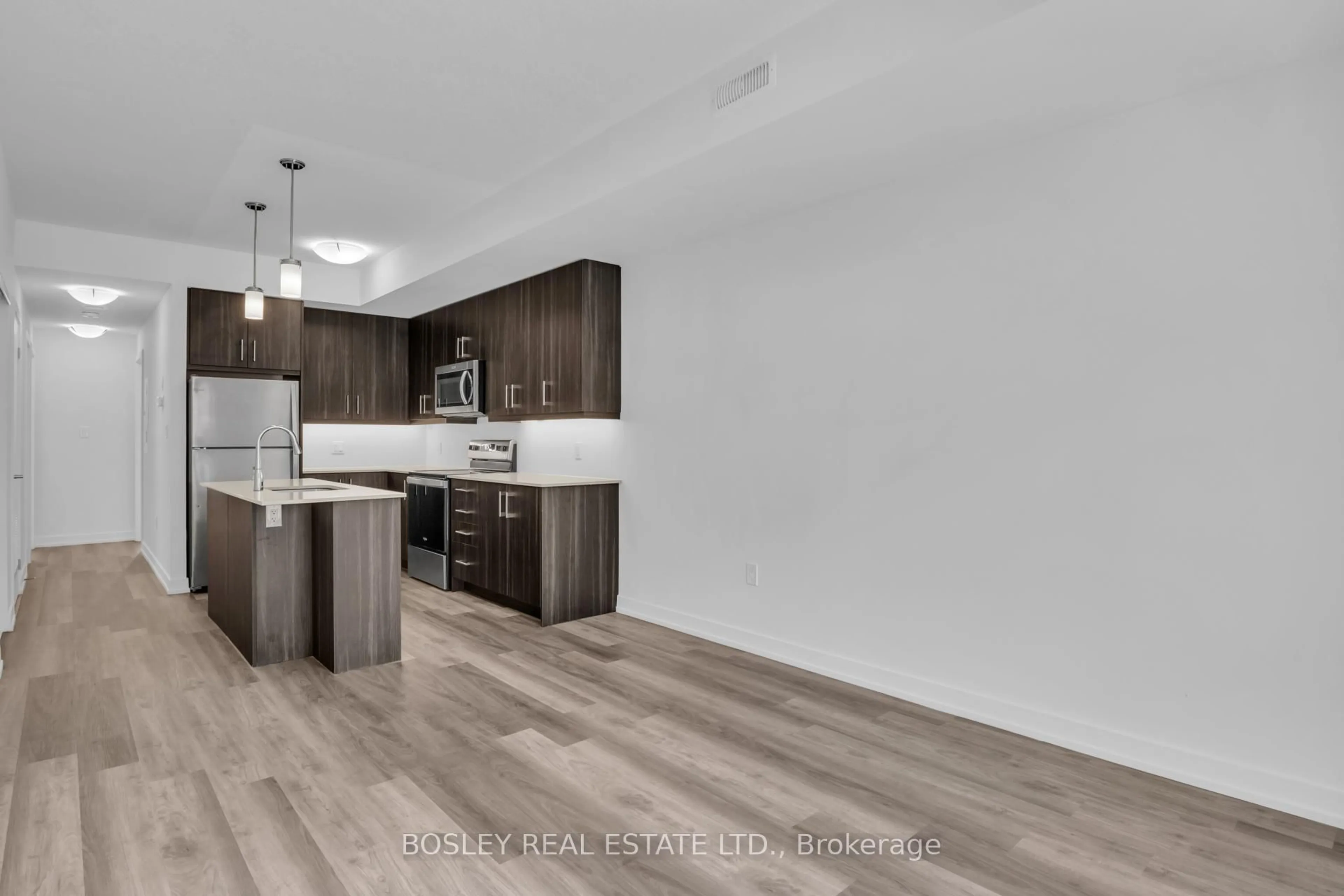 Open concept kitchen, wood/laminate floor for 20 Palace St, Kitchener Ontario N2E 0J3