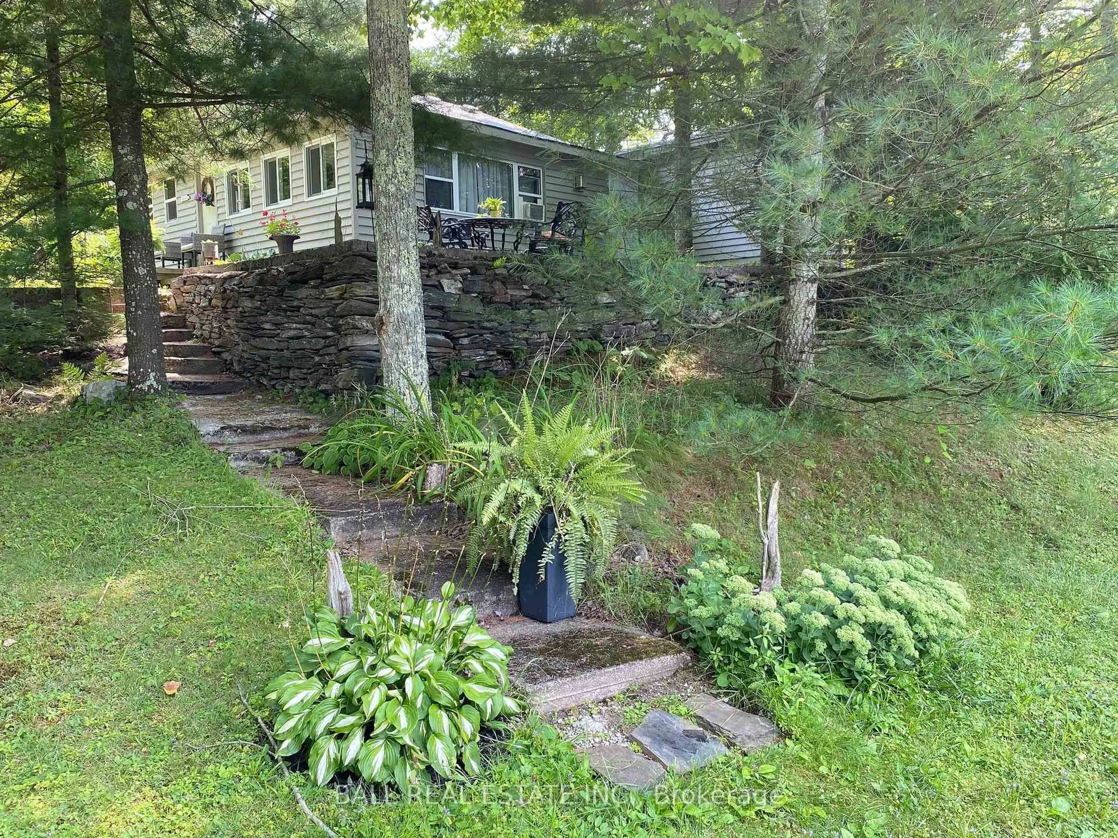 A pic from outside/outdoor area/front of a property/back of a property/a pic from drone, water/lake/river/ocean view for 394 Fire Route 54, Havelock-Belmont-Methuen Ontario K0L 1Z0