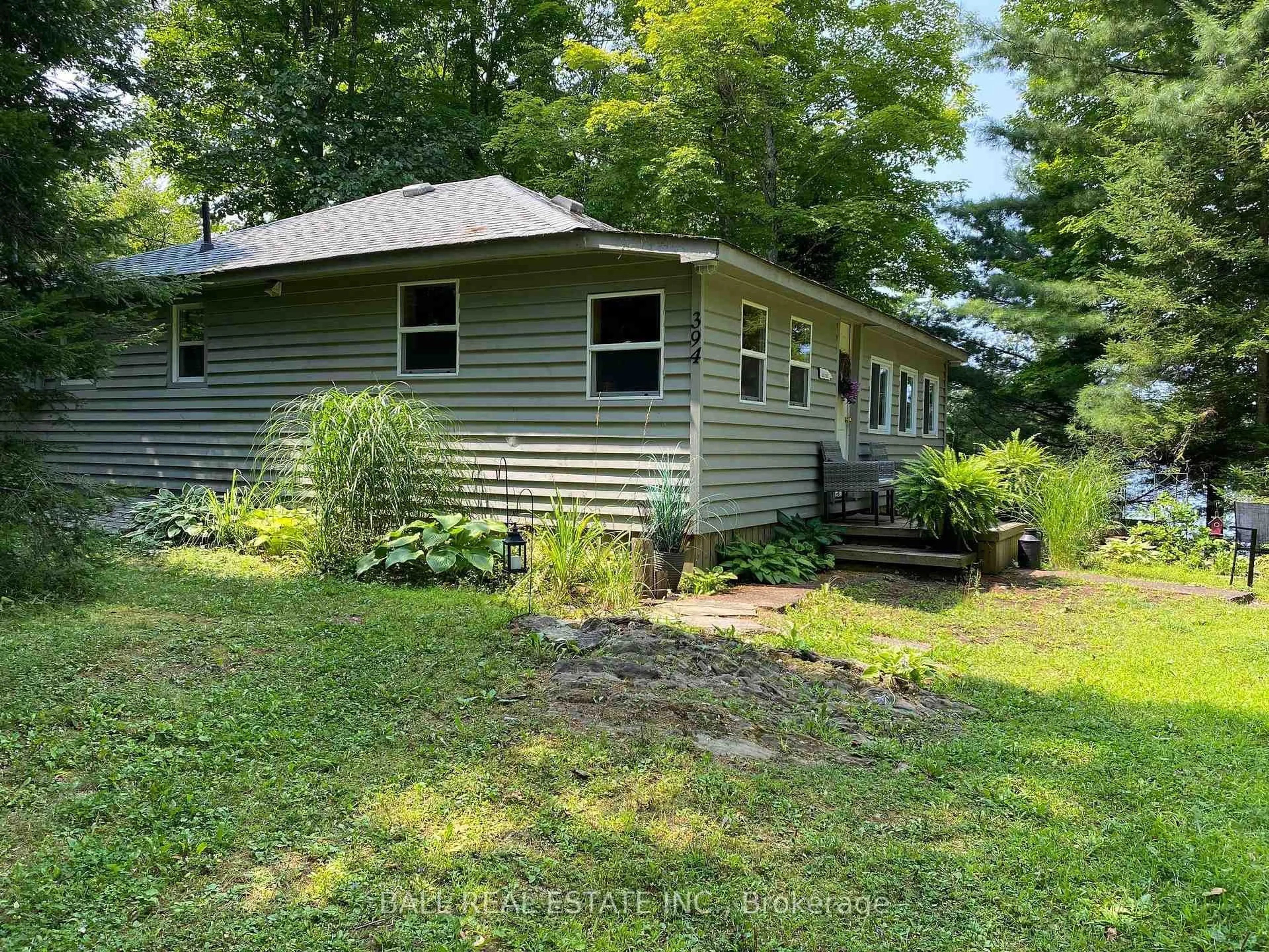 A pic from outside/outdoor area/front of a property/back of a property/a pic from drone, water/lake/river/ocean view for 394 Fire Route 54, Havelock-Belmont-Methuen Ontario K0L 1Z0