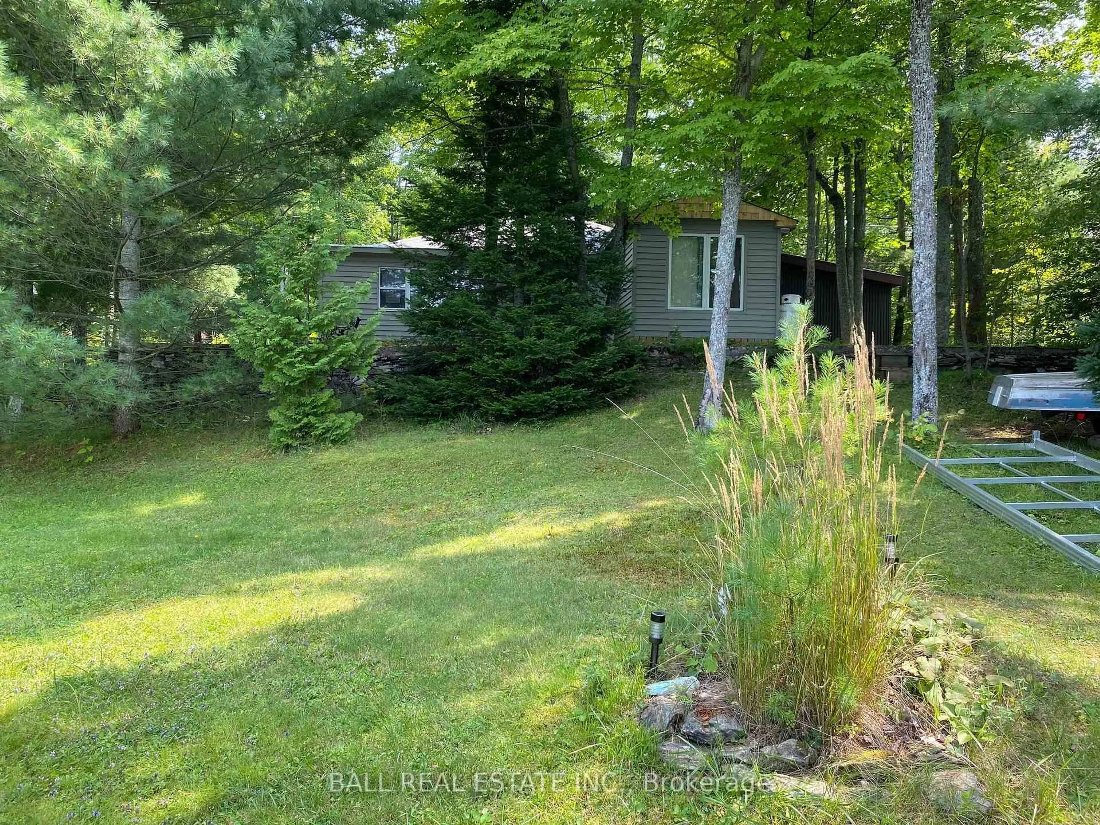 A pic from outside/outdoor area/front of a property/back of a property/a pic from drone, forest/trees view for 394 Fire Route 54, Havelock-Belmont-Methuen Ontario K0L 1Z0