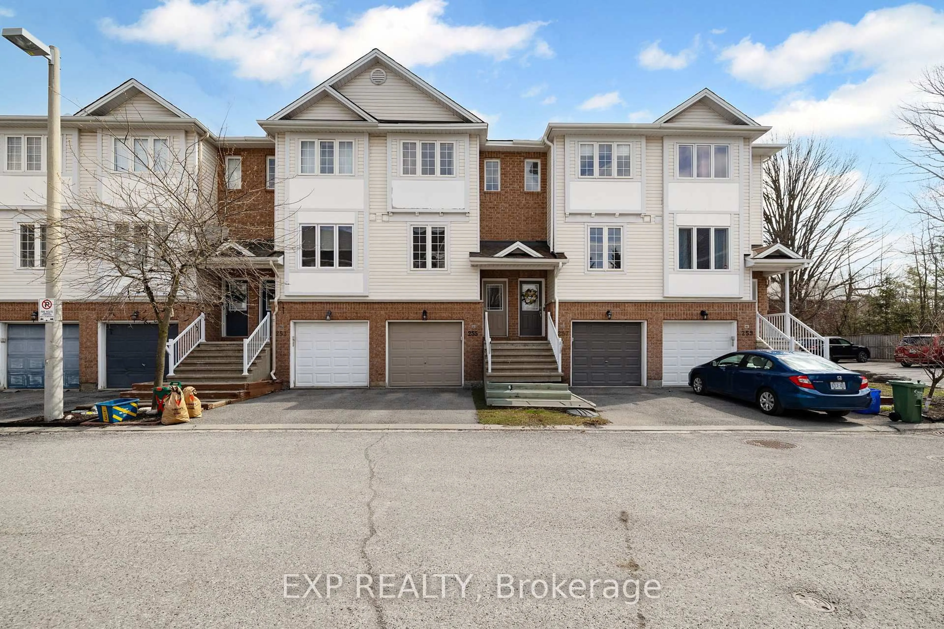 A pic from outside/outdoor area/front of a property/back of a property/a pic from drone, street for 255 Gershwin Private, Ottawa Ontario K2H 1G5