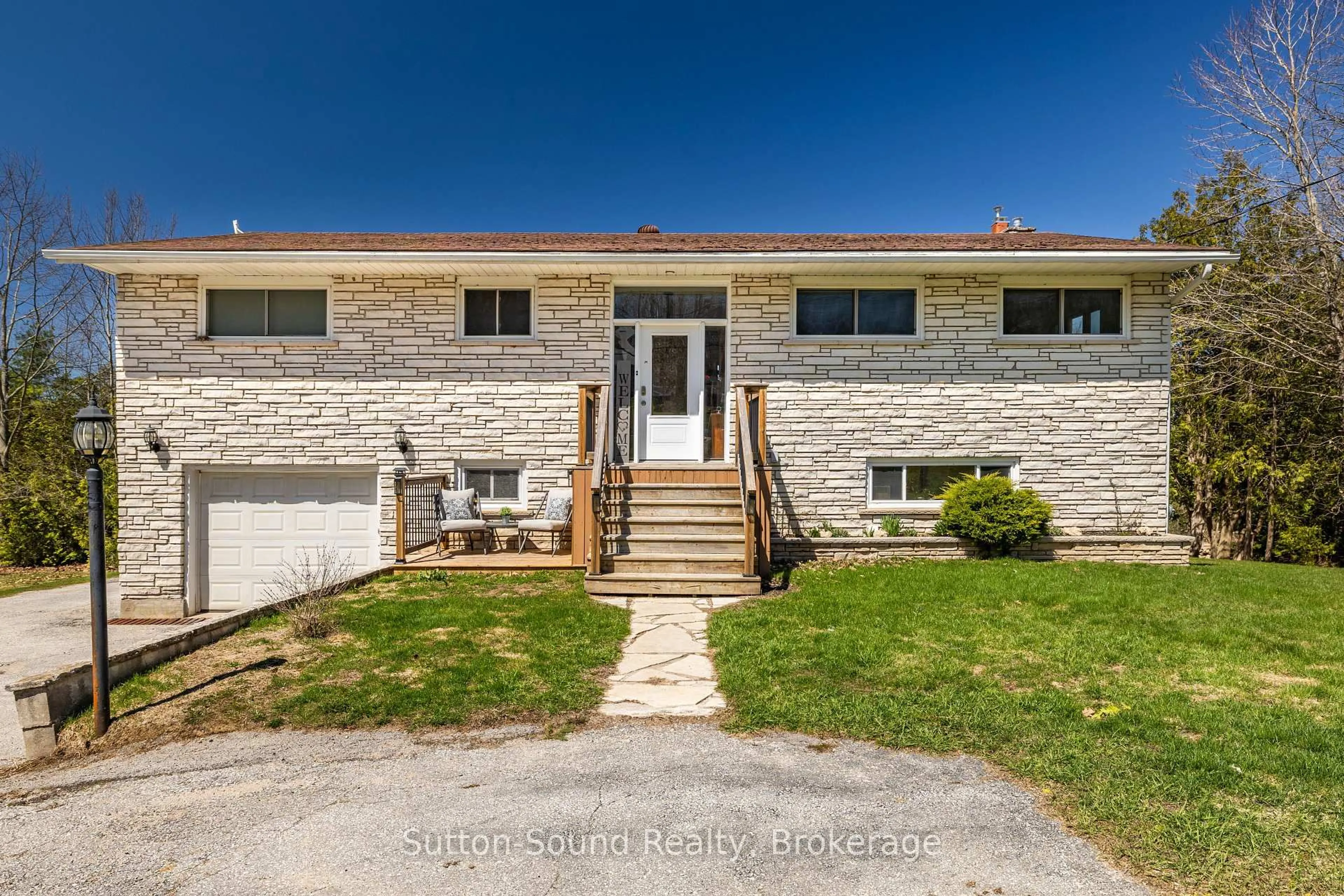 A pic from outside/outdoor area/front of a property/back of a property/a pic from drone, unknown for 501297 Grey Road 1, Georgian Bluffs Ontario N0H 2T0