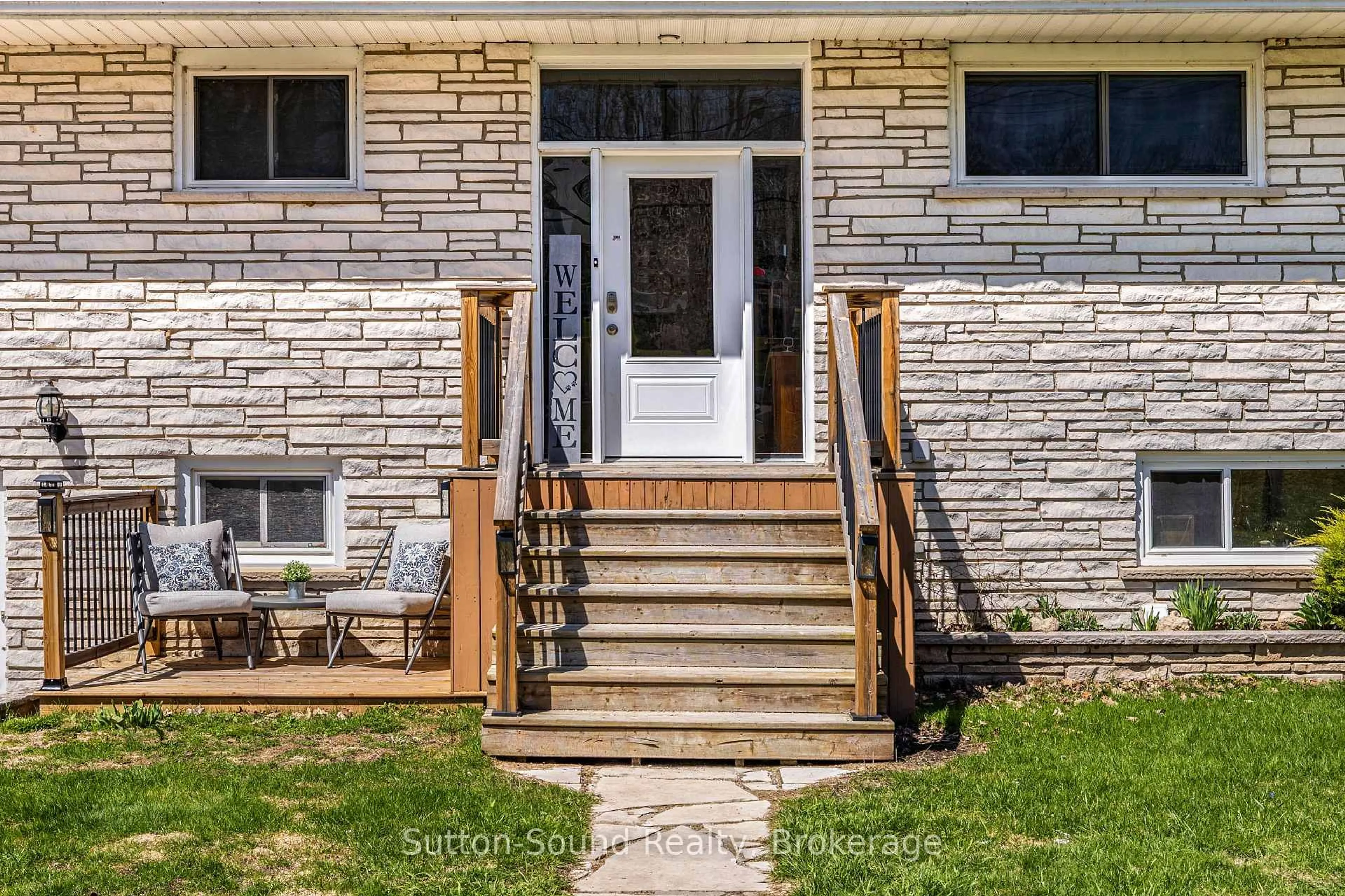 Home with brick exterior material, street for 501297 Grey Road 1, Georgian Bluffs Ontario N0H 2T0