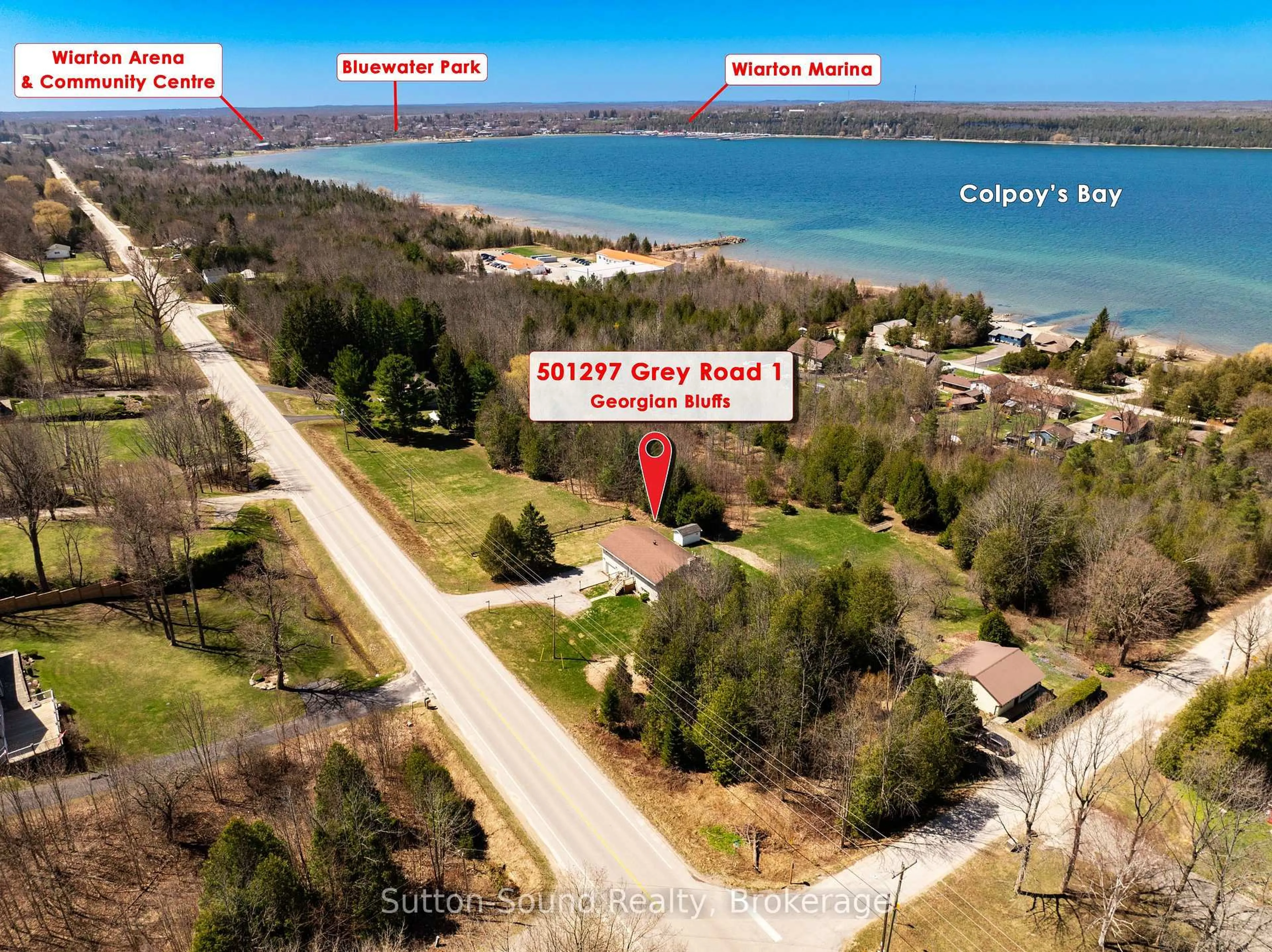A pic from outside/outdoor area/front of a property/back of a property/a pic from drone, water/lake/river/ocean view for 501297 Grey Road 1, Georgian Bluffs Ontario N0H 2T0
