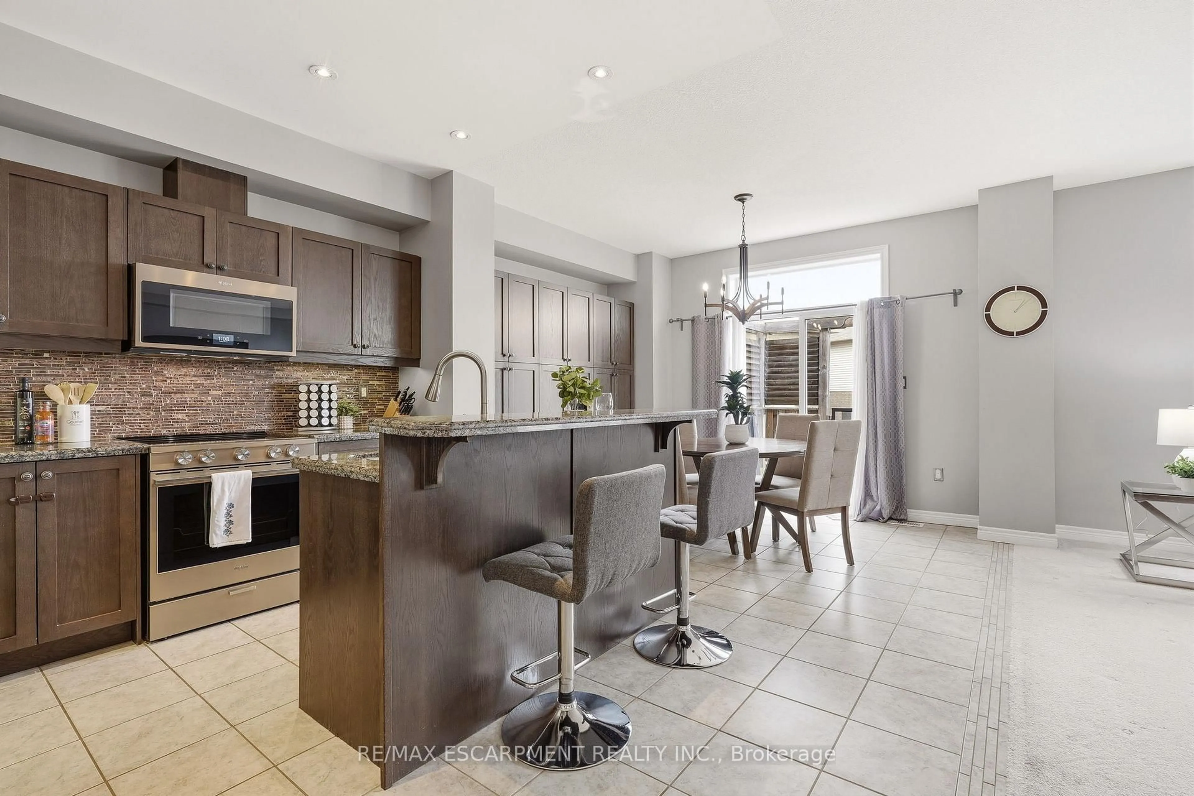 Open concept kitchen, ceramic/tile floor for 21 House Lane, Hamilton Ontario L9K 0G1