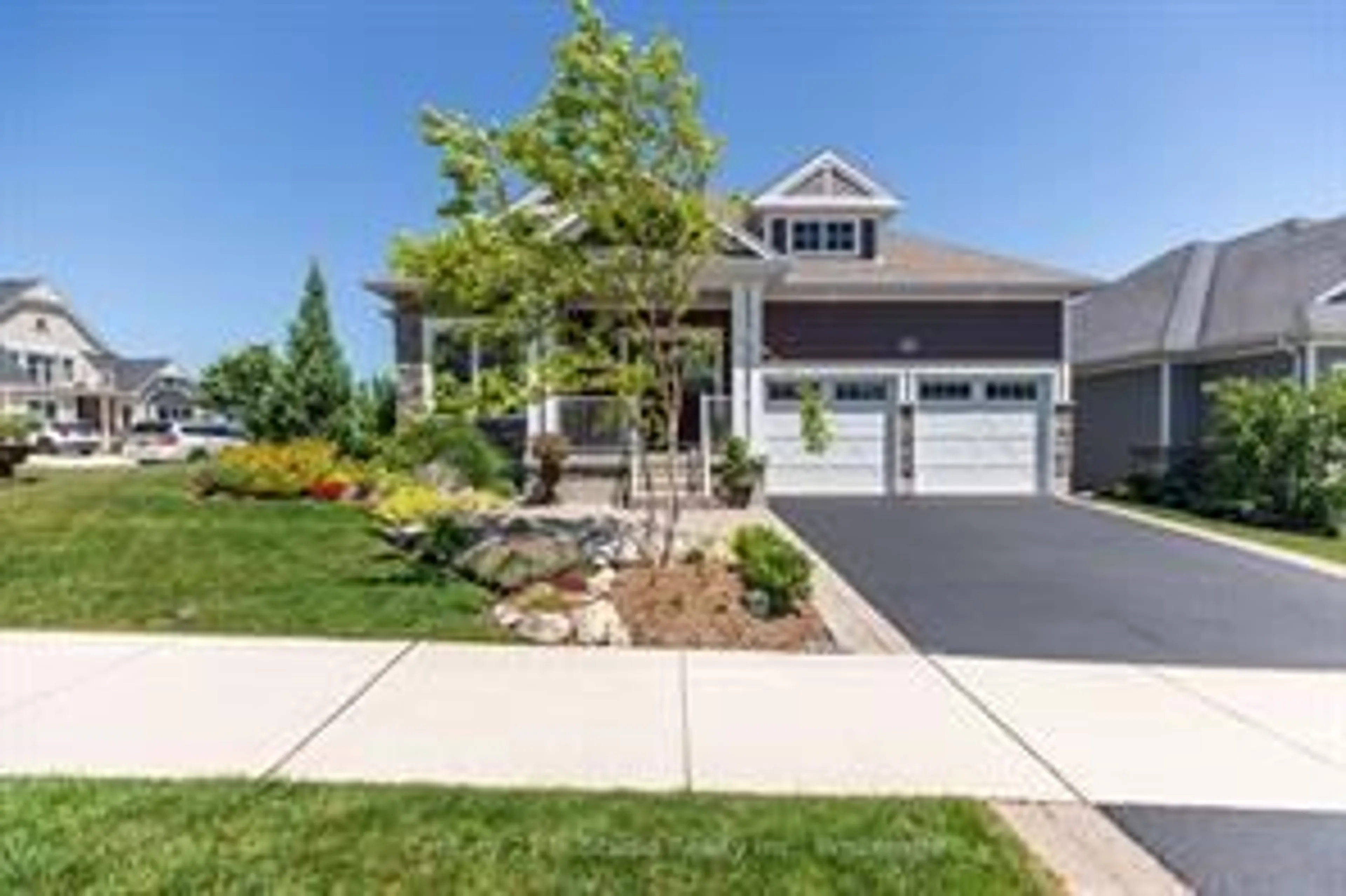 Home with vinyl exterior material, street for 209 Snowberry Lane, Georgian Bluffs Ontario N0H 1S0