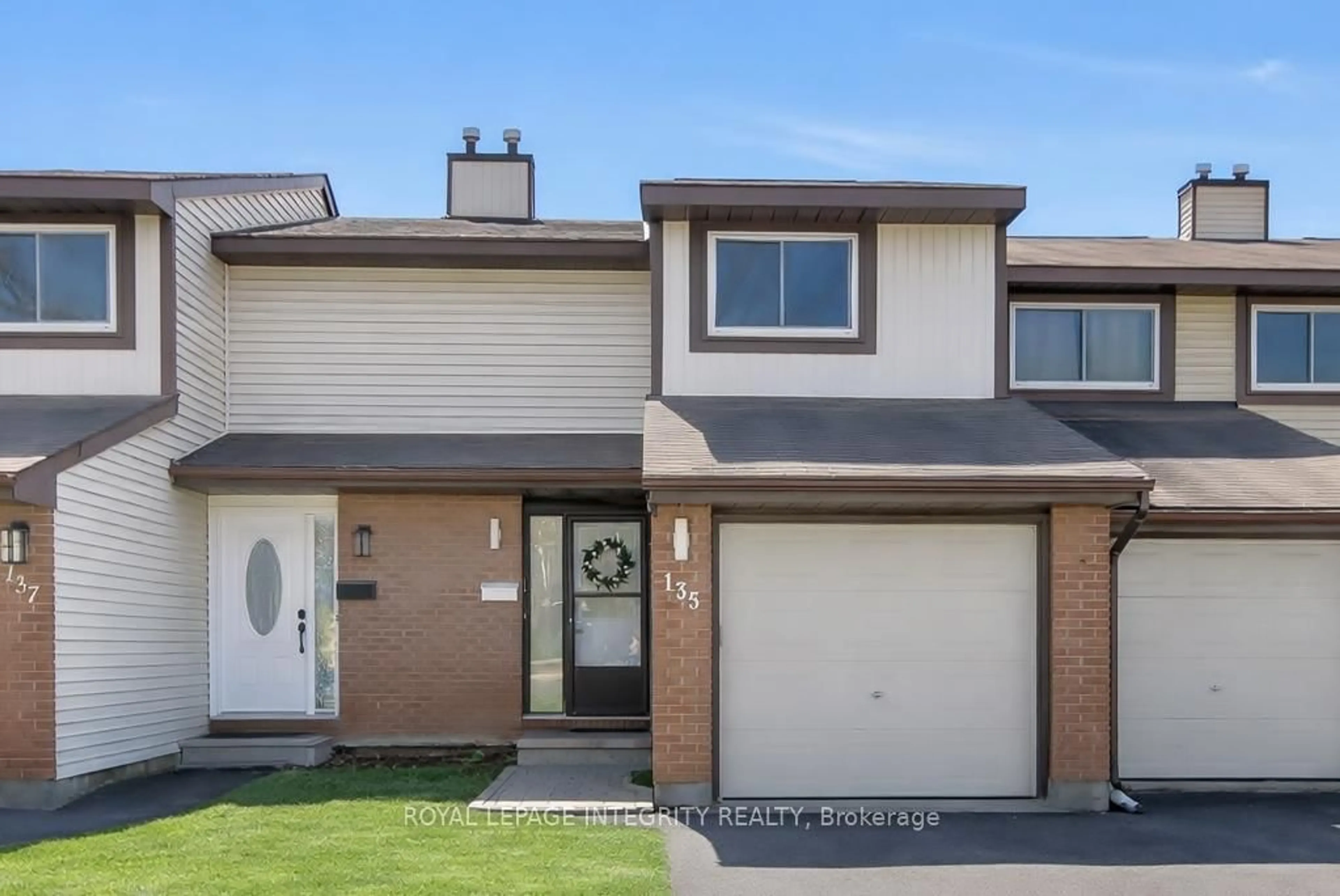 Home with vinyl exterior material, street for 135 Castlefrank Rd #22, Kanata Ontario K2L 2Y2