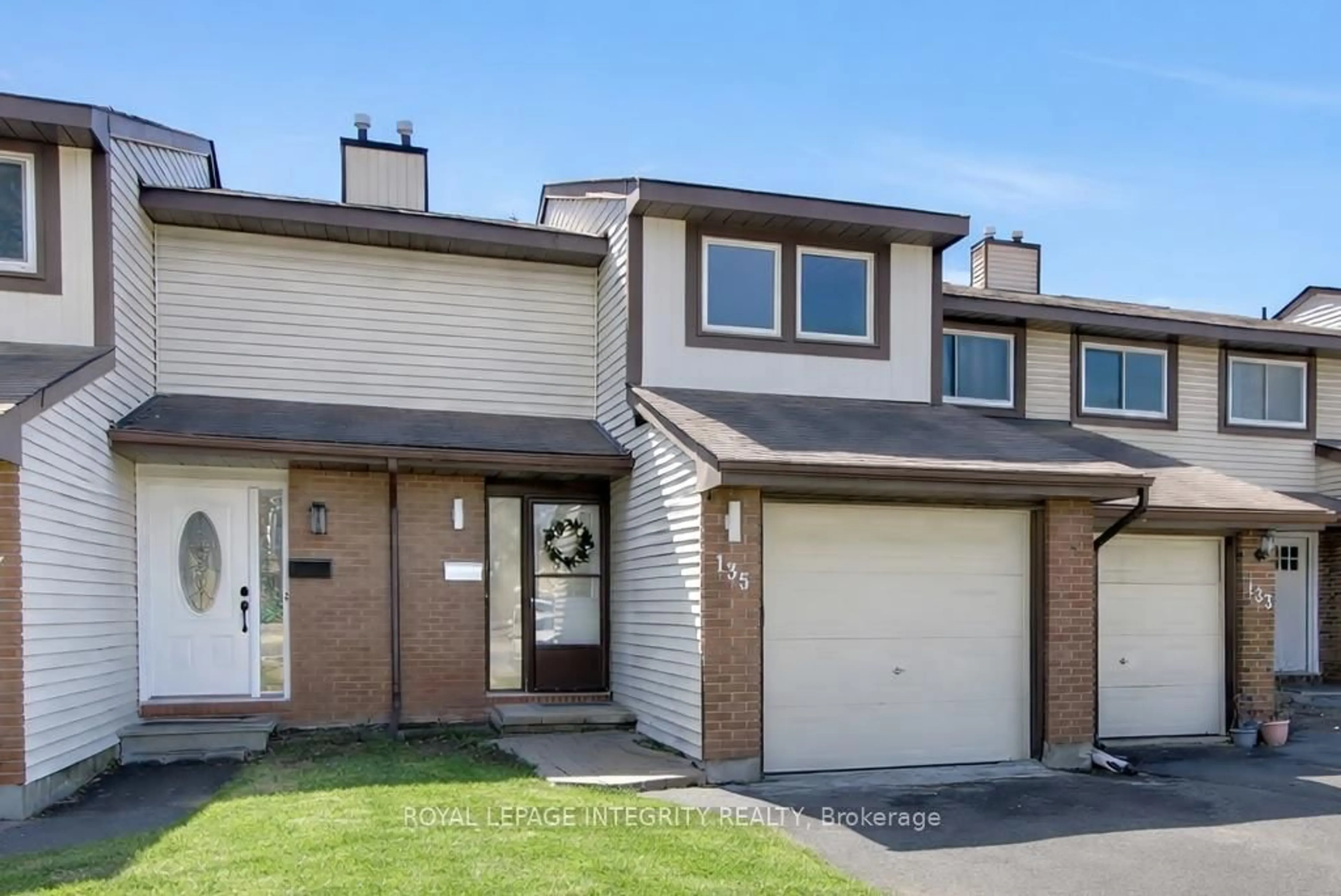 Home with vinyl exterior material, street for 135 Castlefrank Rd #22, Kanata Ontario K2L 2Y2