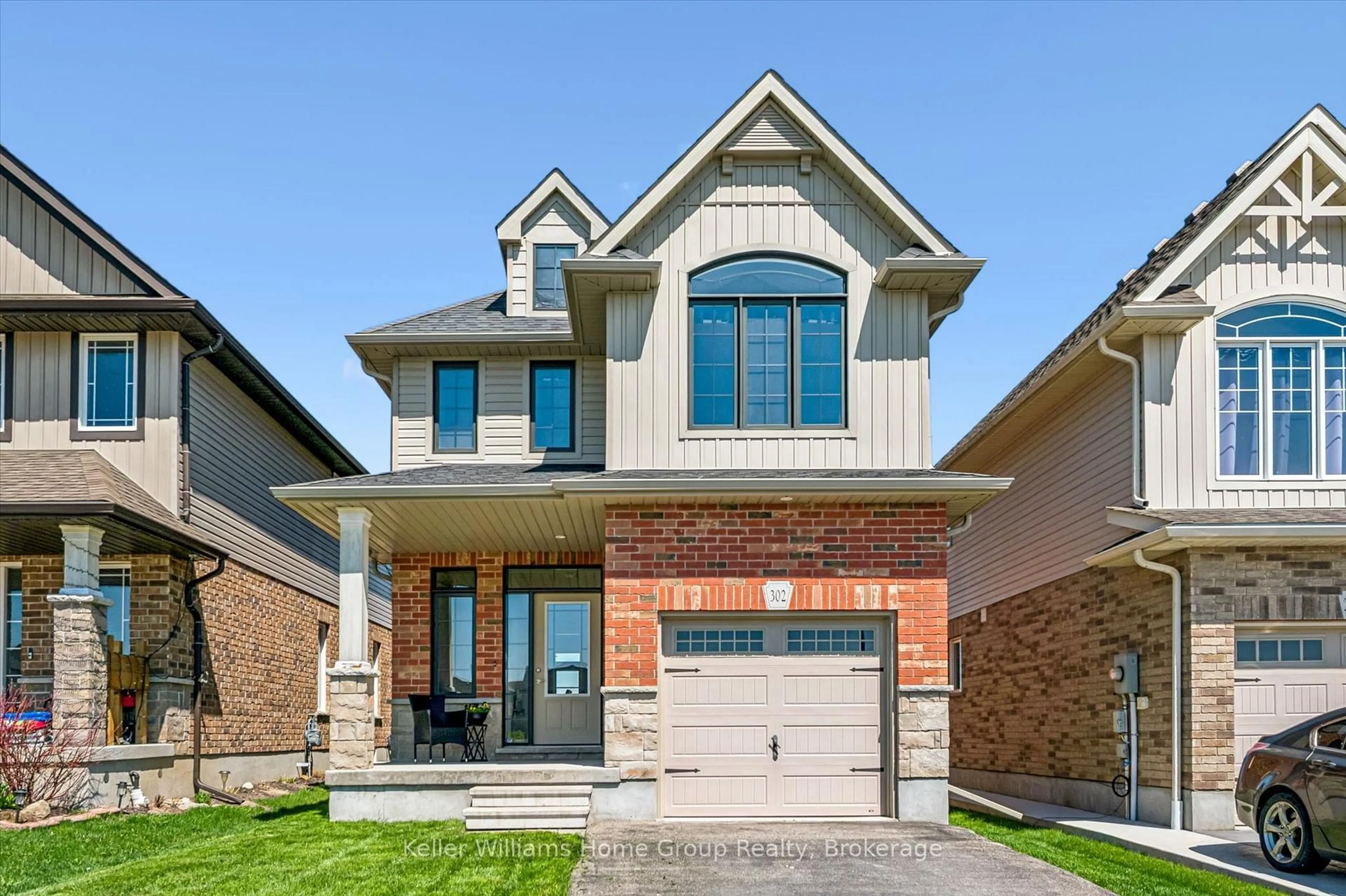 Home with brick exterior material, street for 302 William St, Woolwich Ontario N3B 0B5