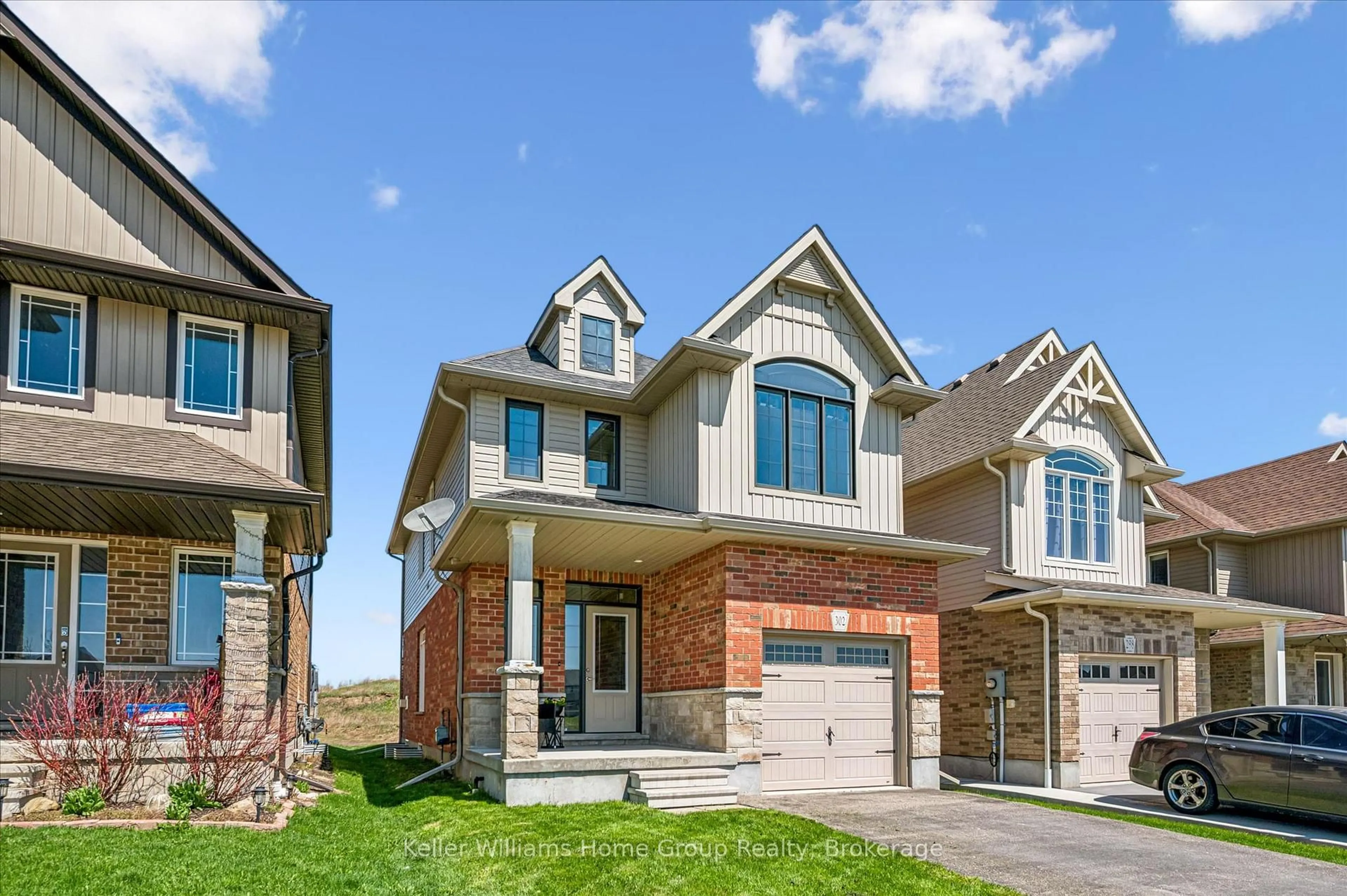 Home with brick exterior material, street for 302 William St, Woolwich Ontario N3B 0B5