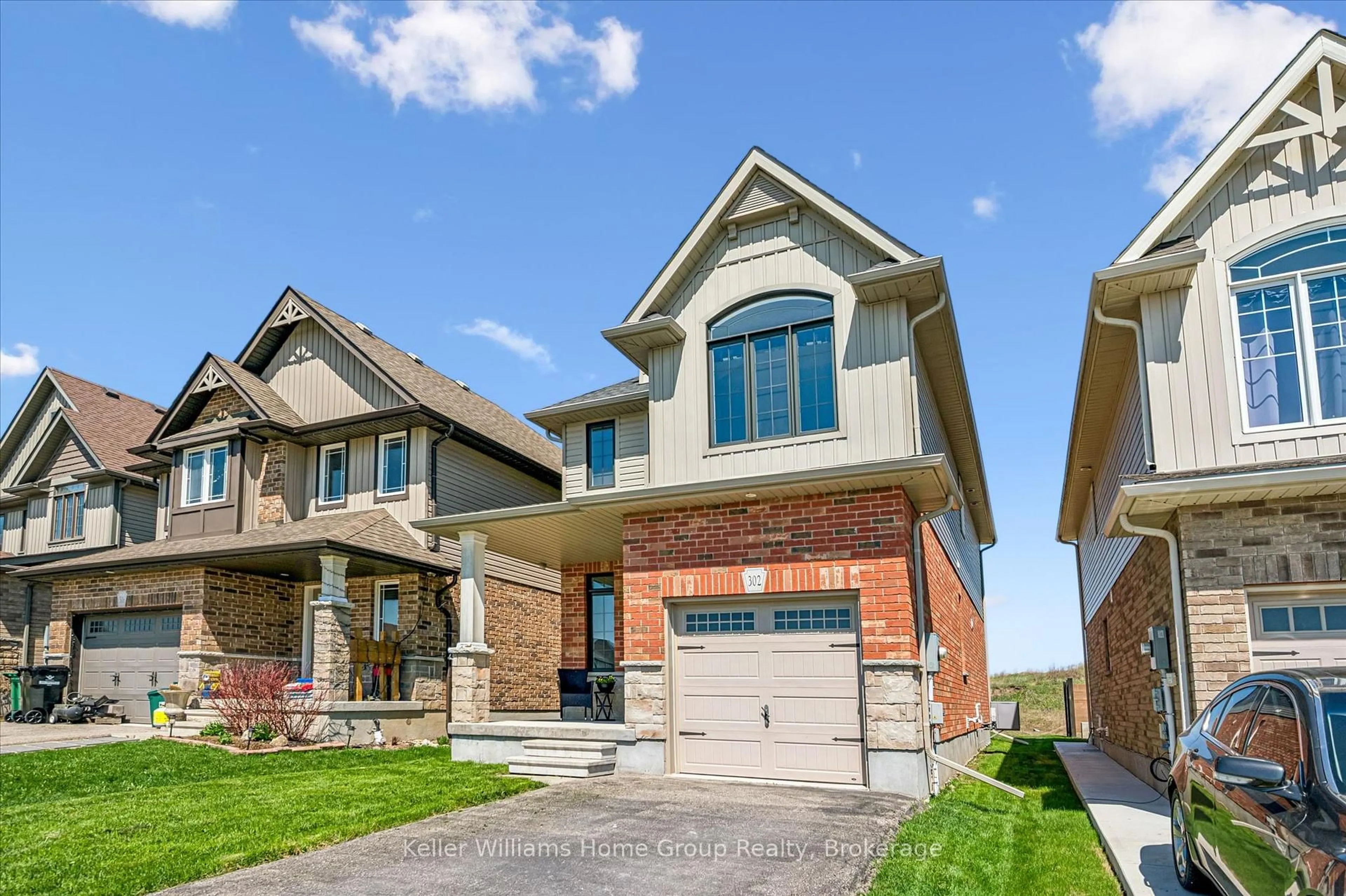 Home with brick exterior material, street for 302 William St, Woolwich Ontario N3B 0B5