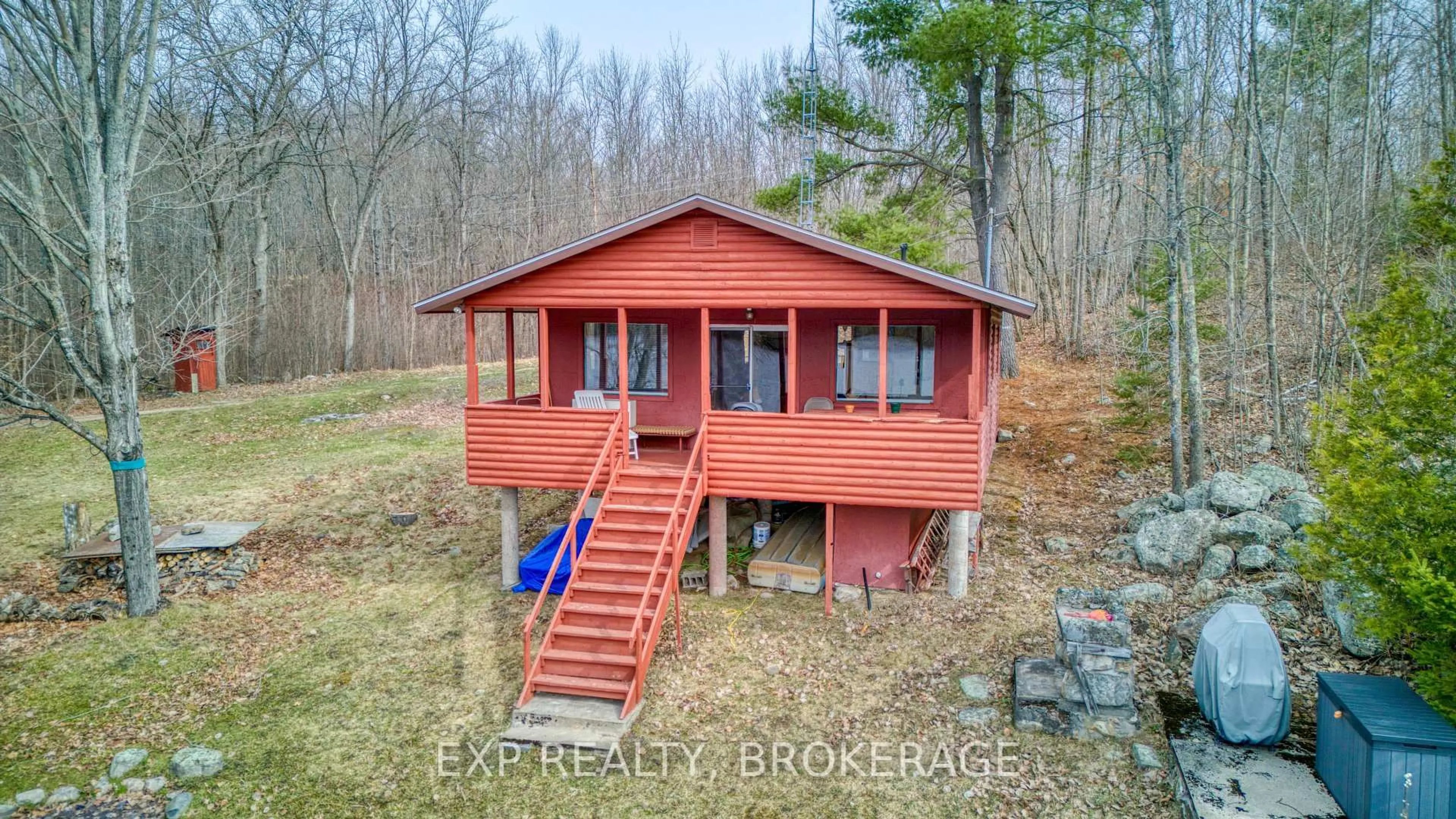 A pic from outside/outdoor area/front of a property/back of a property/a pic from drone, water/lake/river/ocean view for 1027 Rudy Lane, Arden Ontario K0H 1B0