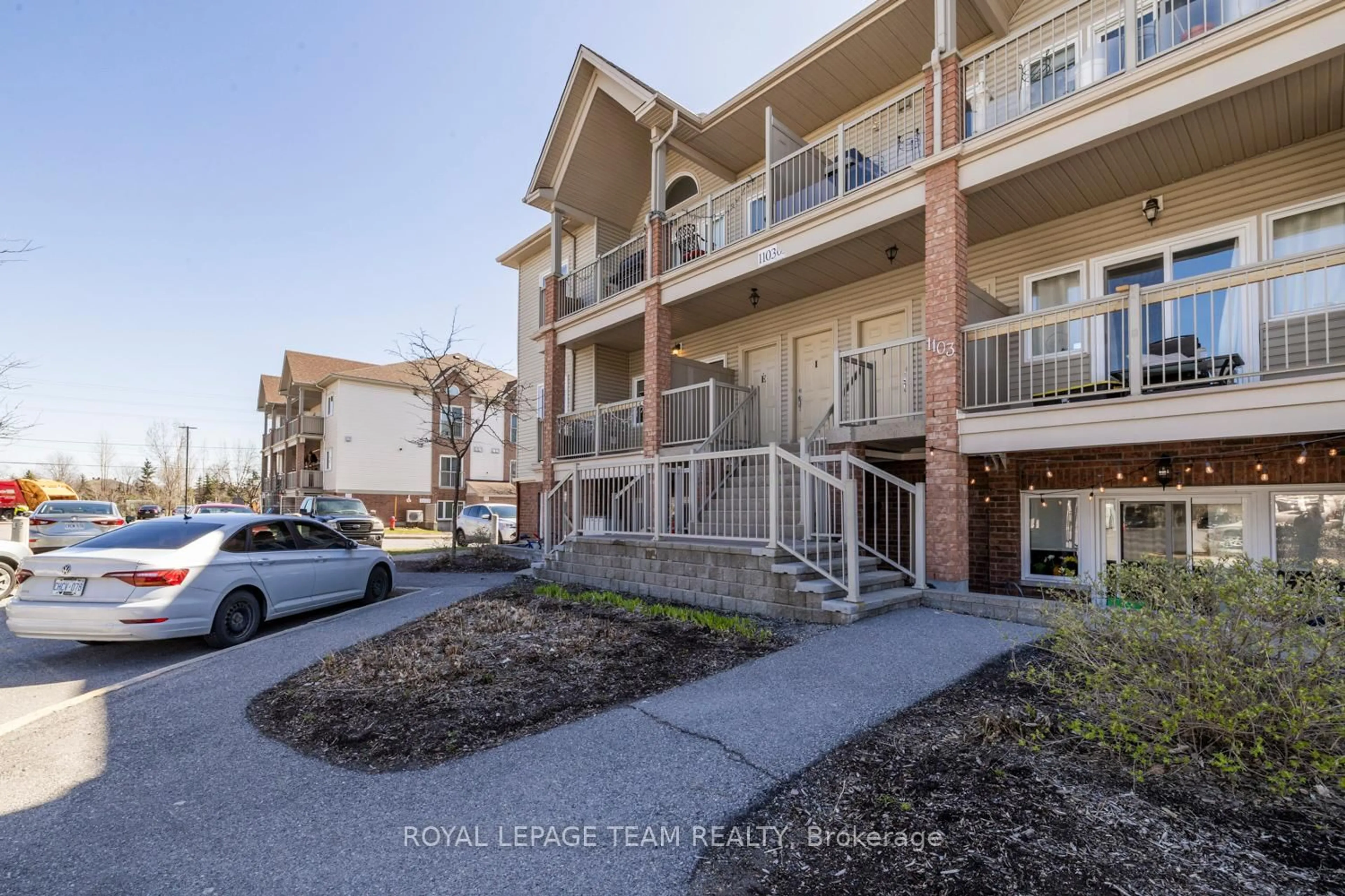 A pic from outside/outdoor area/front of a property/back of a property/a pic from drone, unknown for 1103 STITTSVILLE MAIN St #E, Stittsville Ontario K2S 0C7