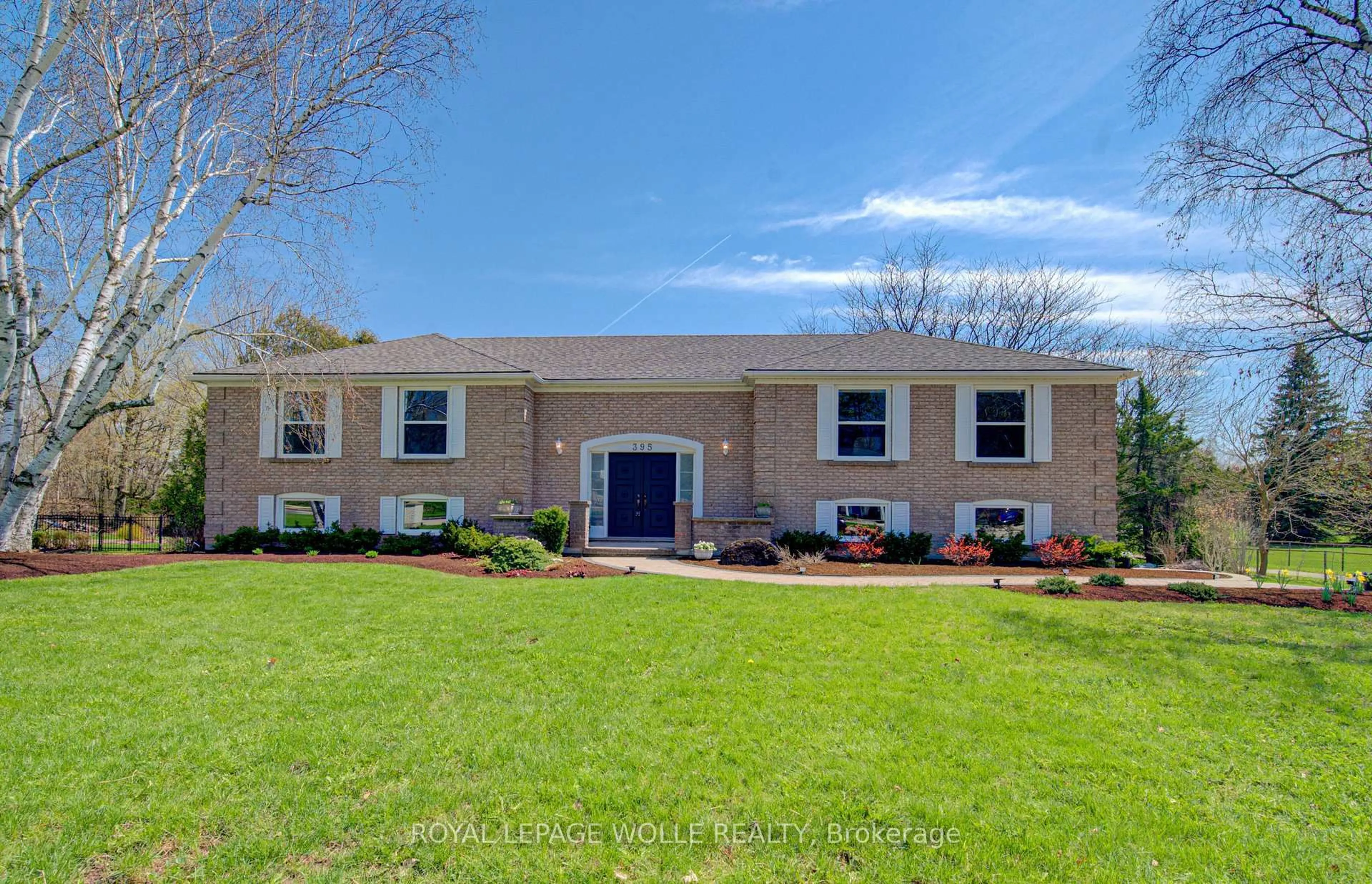 Home with brick exterior material, street for 395 Warrington Dr, Waterloo Ontario N2L 2P7