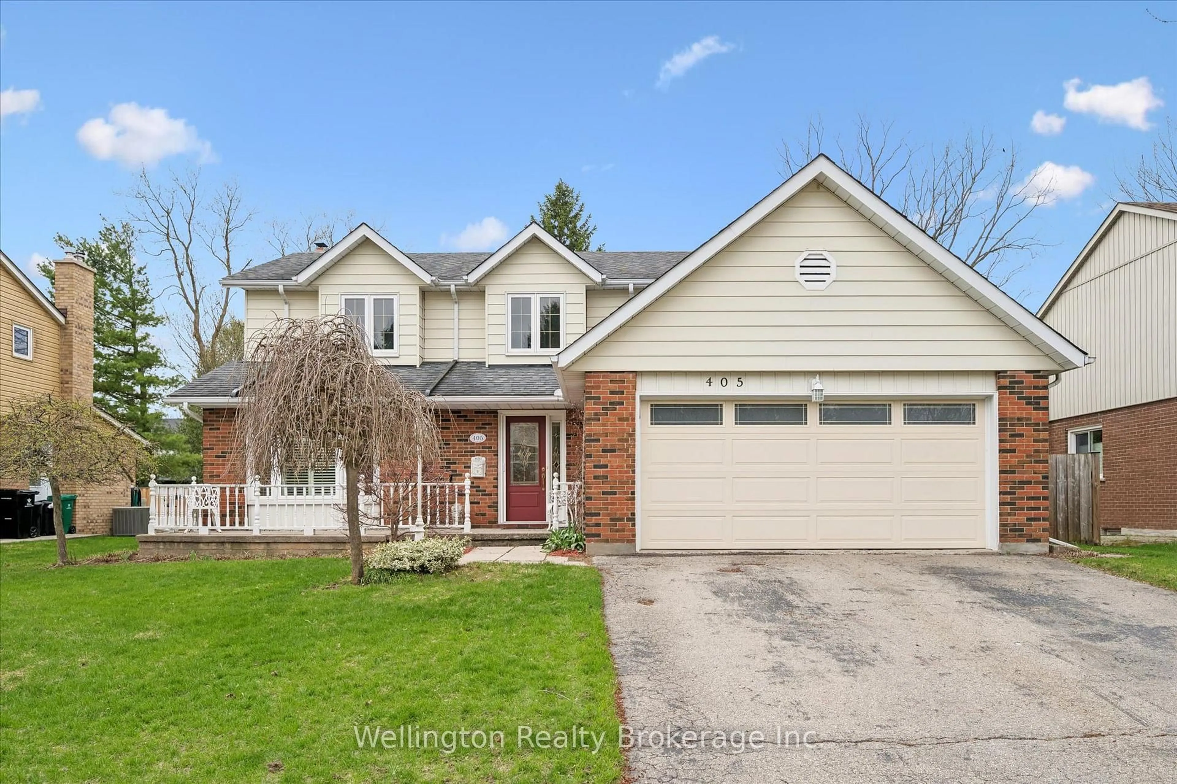 Home with brick exterior material, street for 405 Clairbrook Cres, Waterloo Ontario N2L 5V6