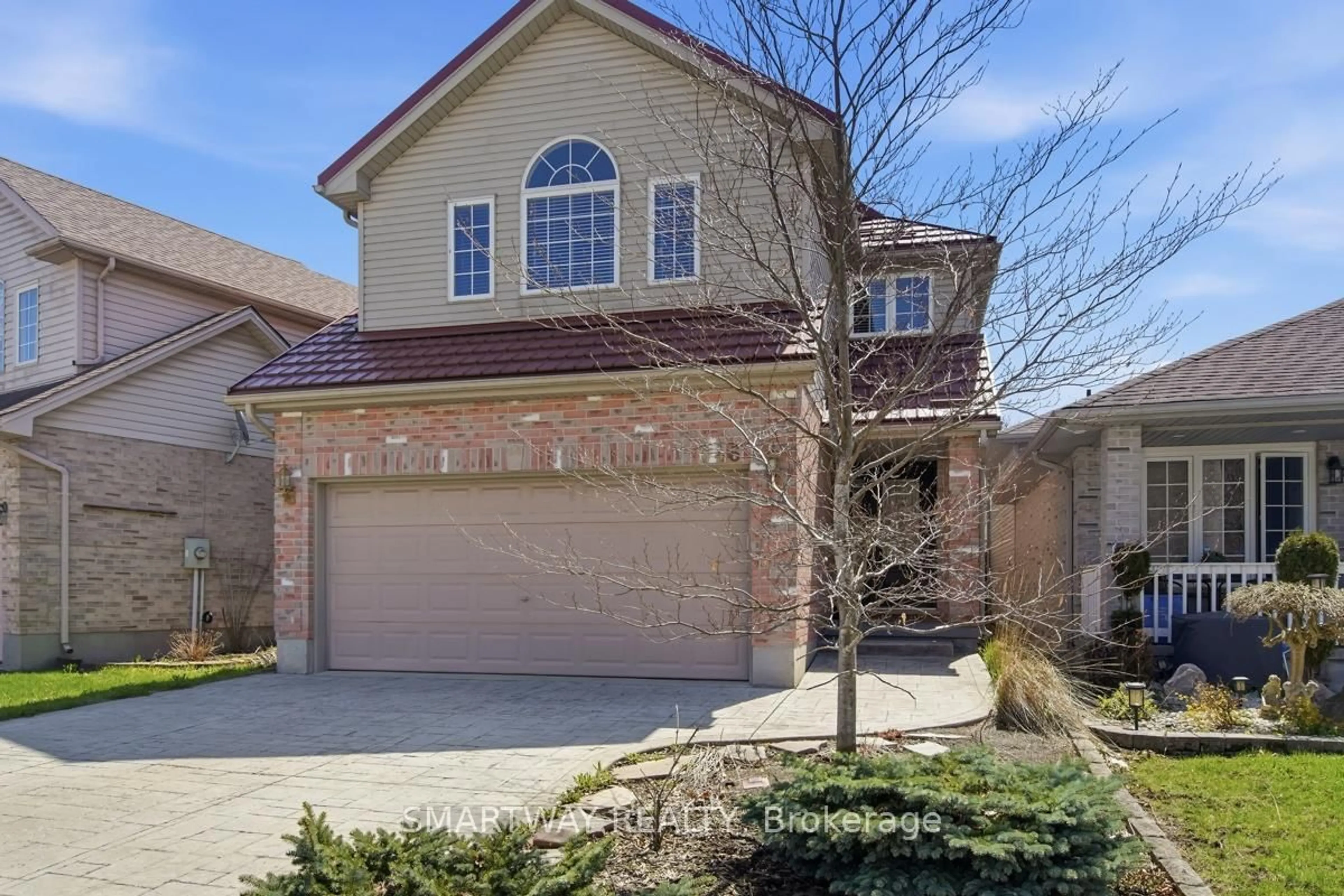 Home with brick exterior material, street for 646 Ridgeview Dr, London East Ontario N5Y 5T8
