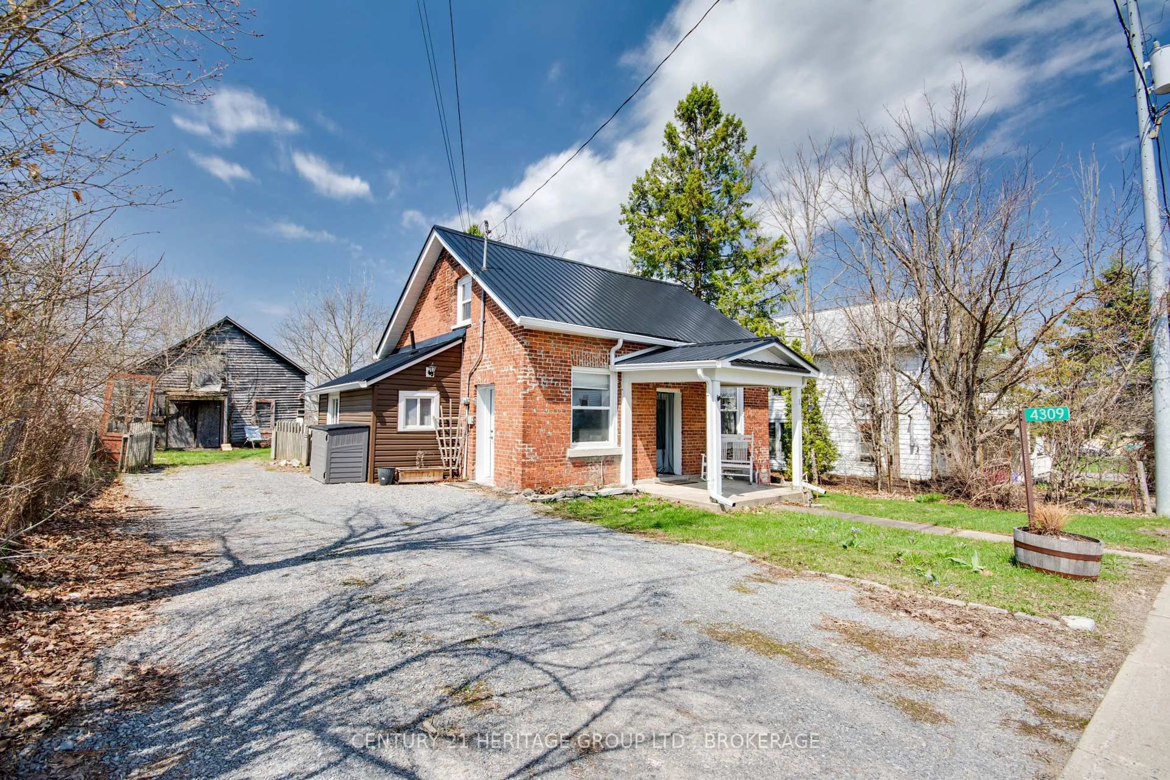 Home with brick exterior material, street for 4309 Stagecoach Rd, Sydenham Ontario K0H 2T0