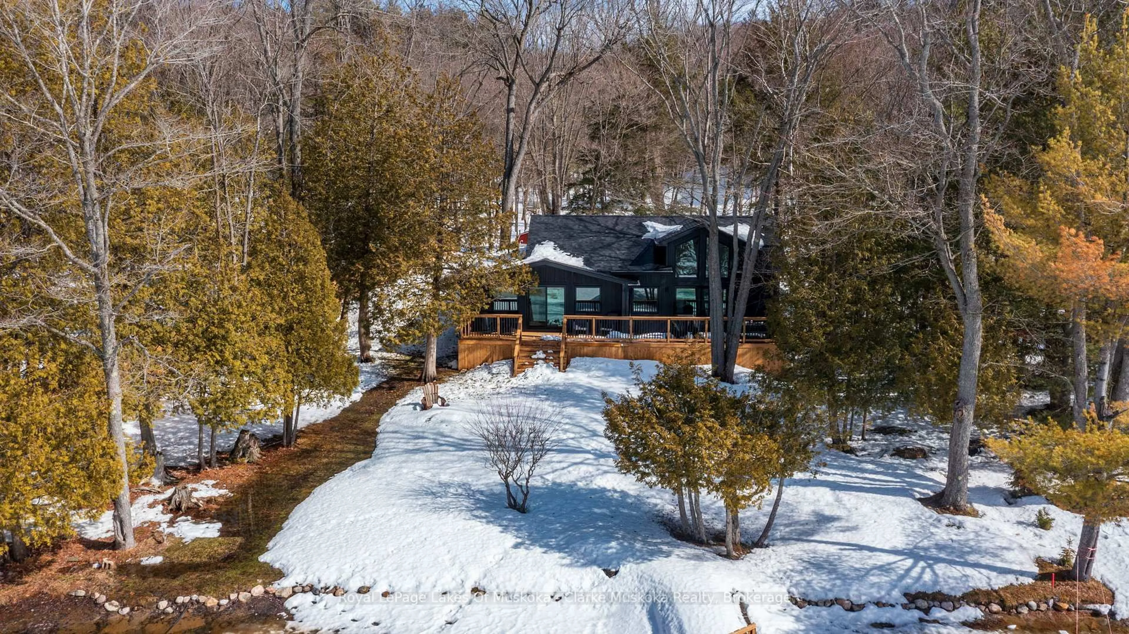 A pic from outside/outdoor area/front of a property/back of a property/a pic from drone, water/lake/river/ocean view for 2324 Highway 141 #21, Muskoka Lakes Ontario P0B 1M0