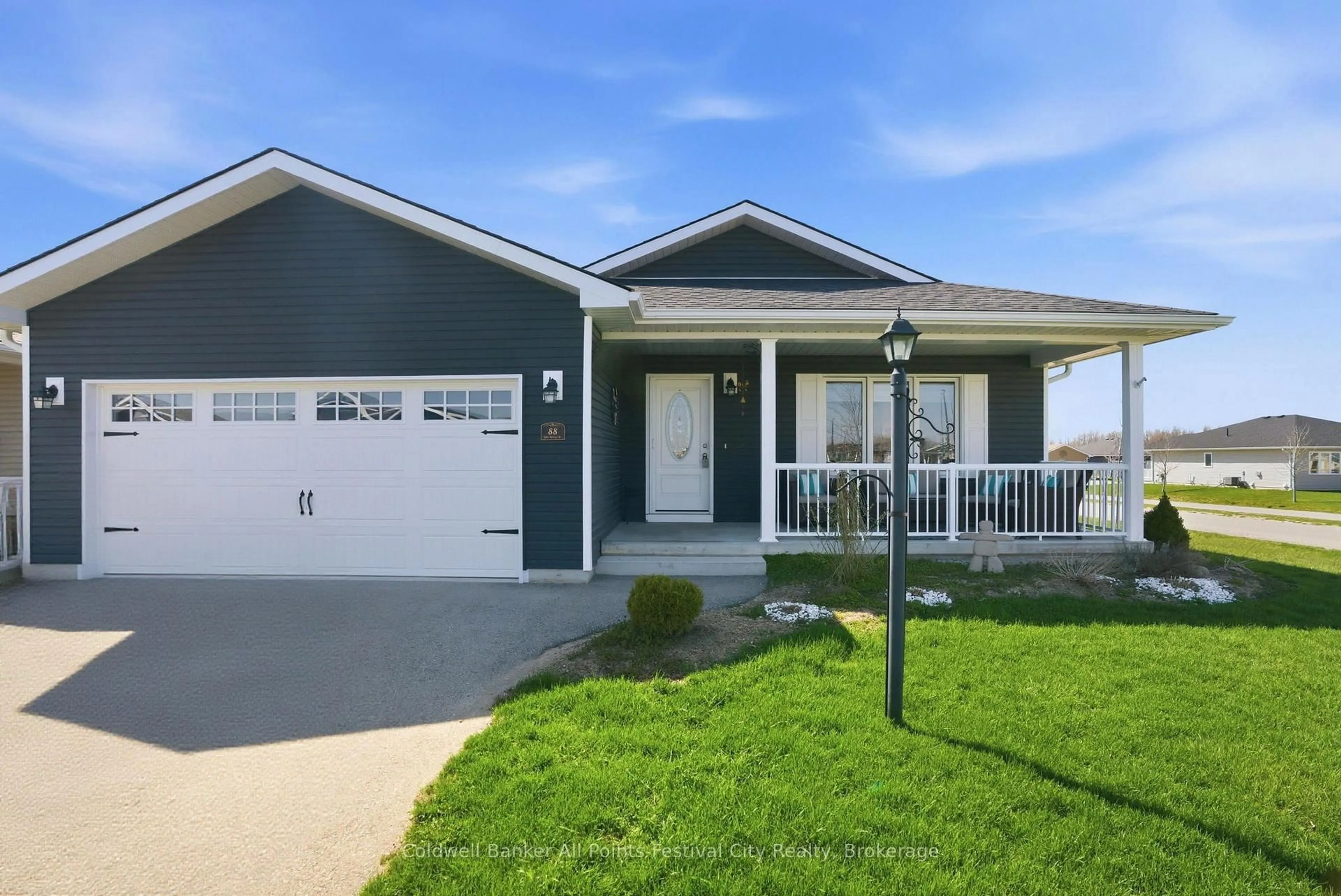 Home with vinyl exterior material, street for 88 Lake Breeze Dr, Ashfield-Colborne-Wawanosh Ontario N7A 0B9