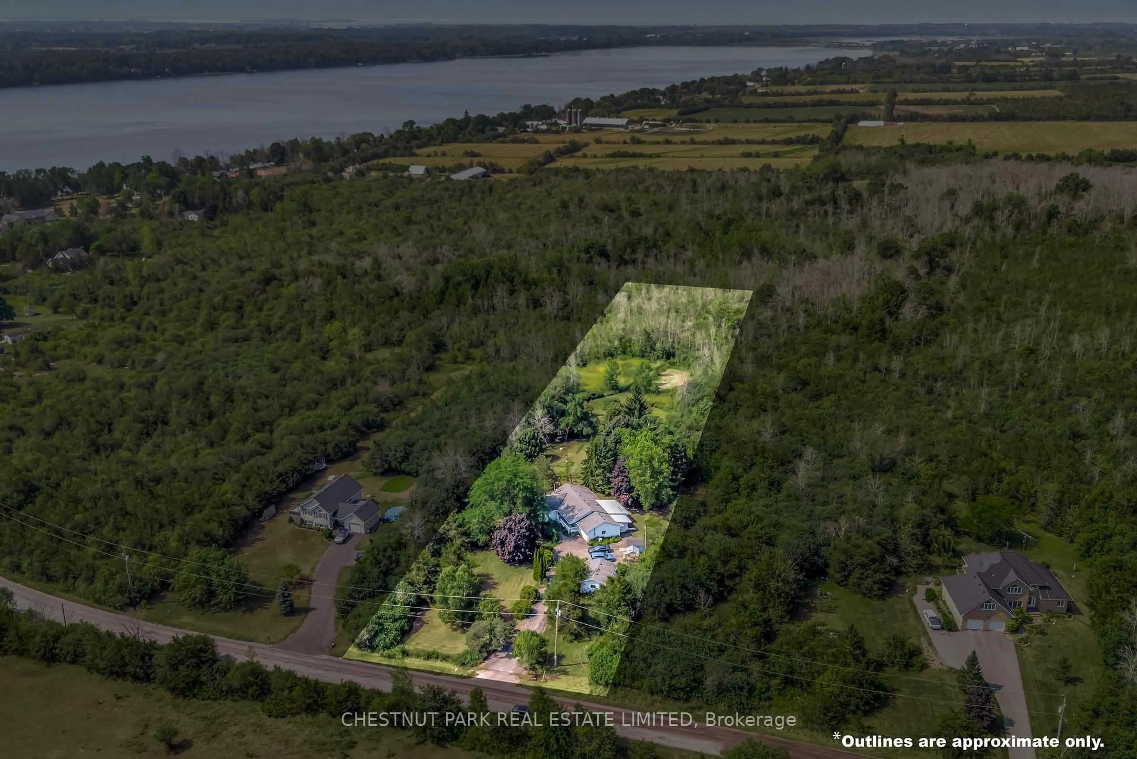 A pic from outside/outdoor area/front of a property/back of a property/a pic from drone, water/lake/river/ocean view for 207 Carnrike Rd, Prince Edward County Ontario K0K 1T0