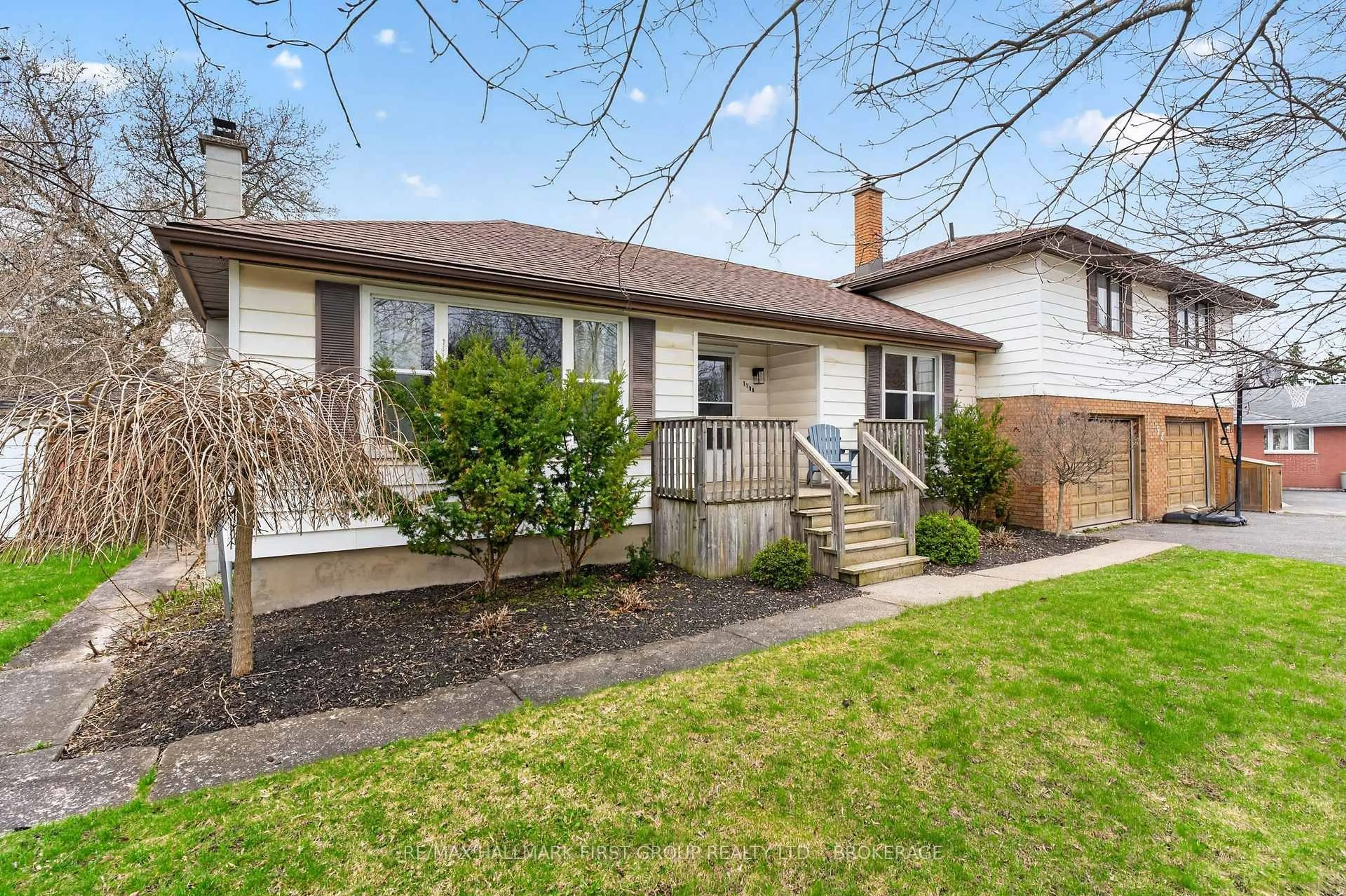 Home with vinyl exterior material, street for 1198 Brass Dr, Kingston Ontario K7M 3M3