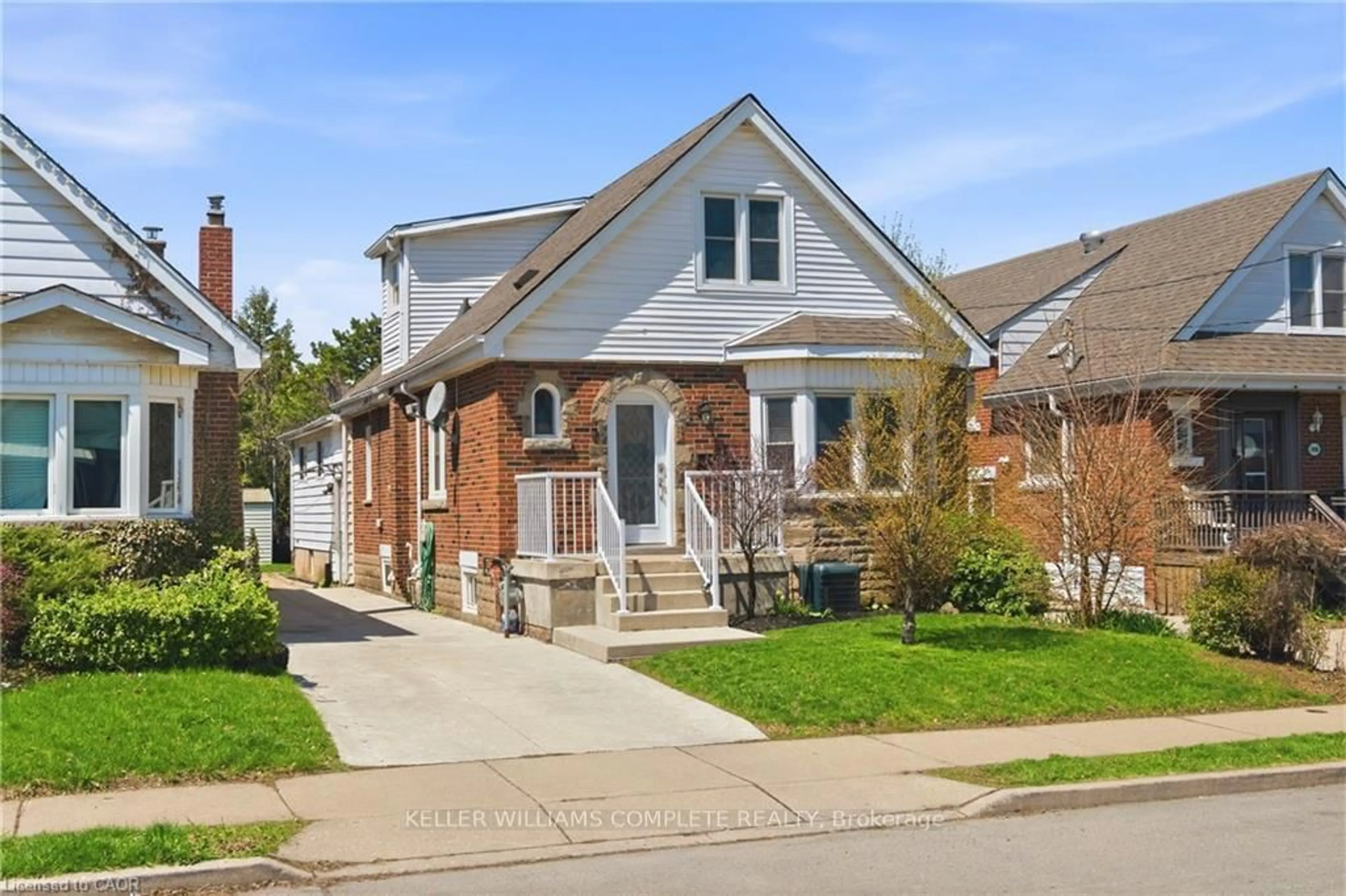 Home with brick exterior material, street for 148 Huxley Ave, Hamilton Ontario L8K 2R1