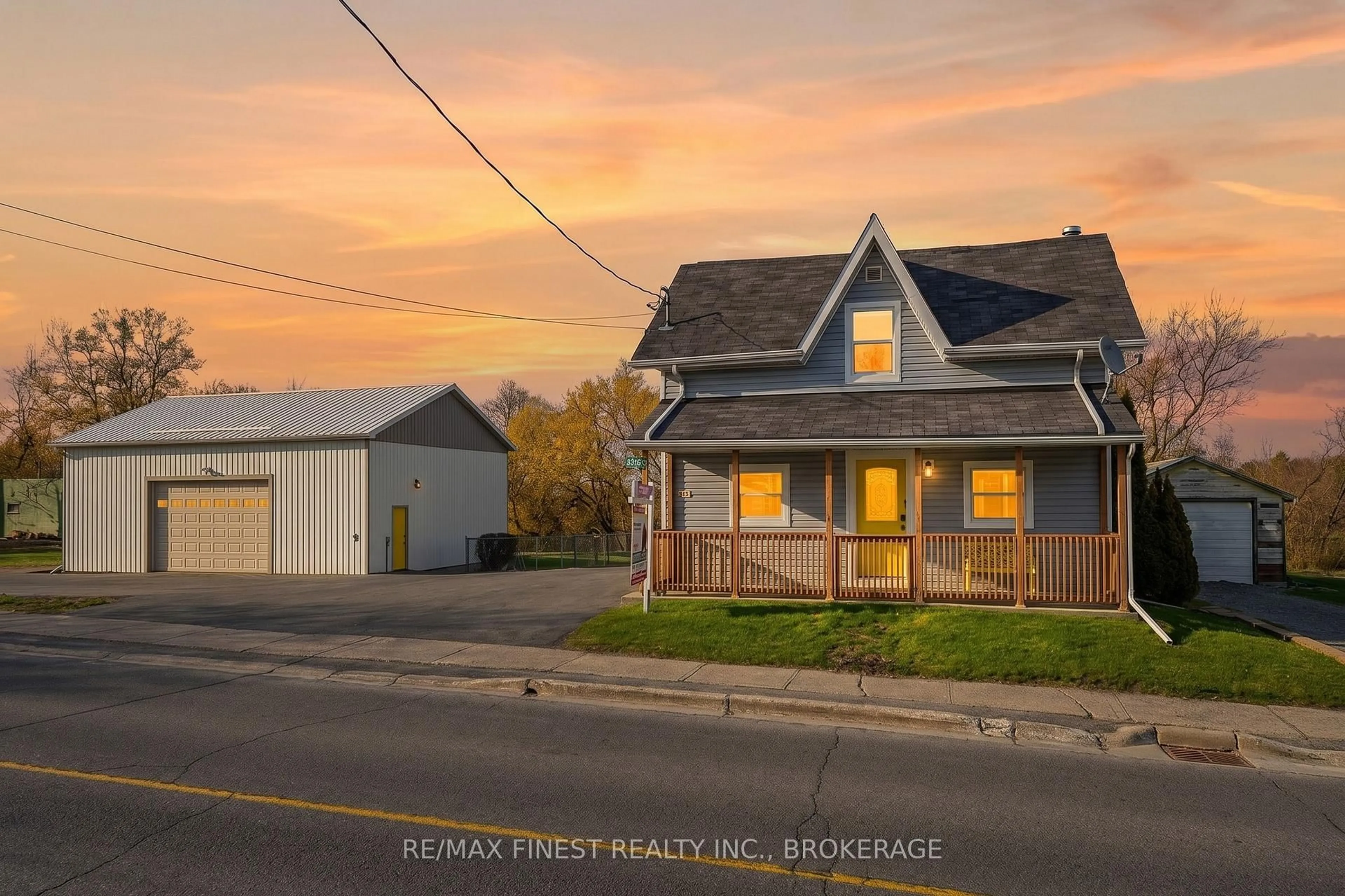 A pic from outside/outdoor area/front of a property/back of a property/a pic from drone, street for 3241 County Rd 6, Yarker Ontario K0K 3N0