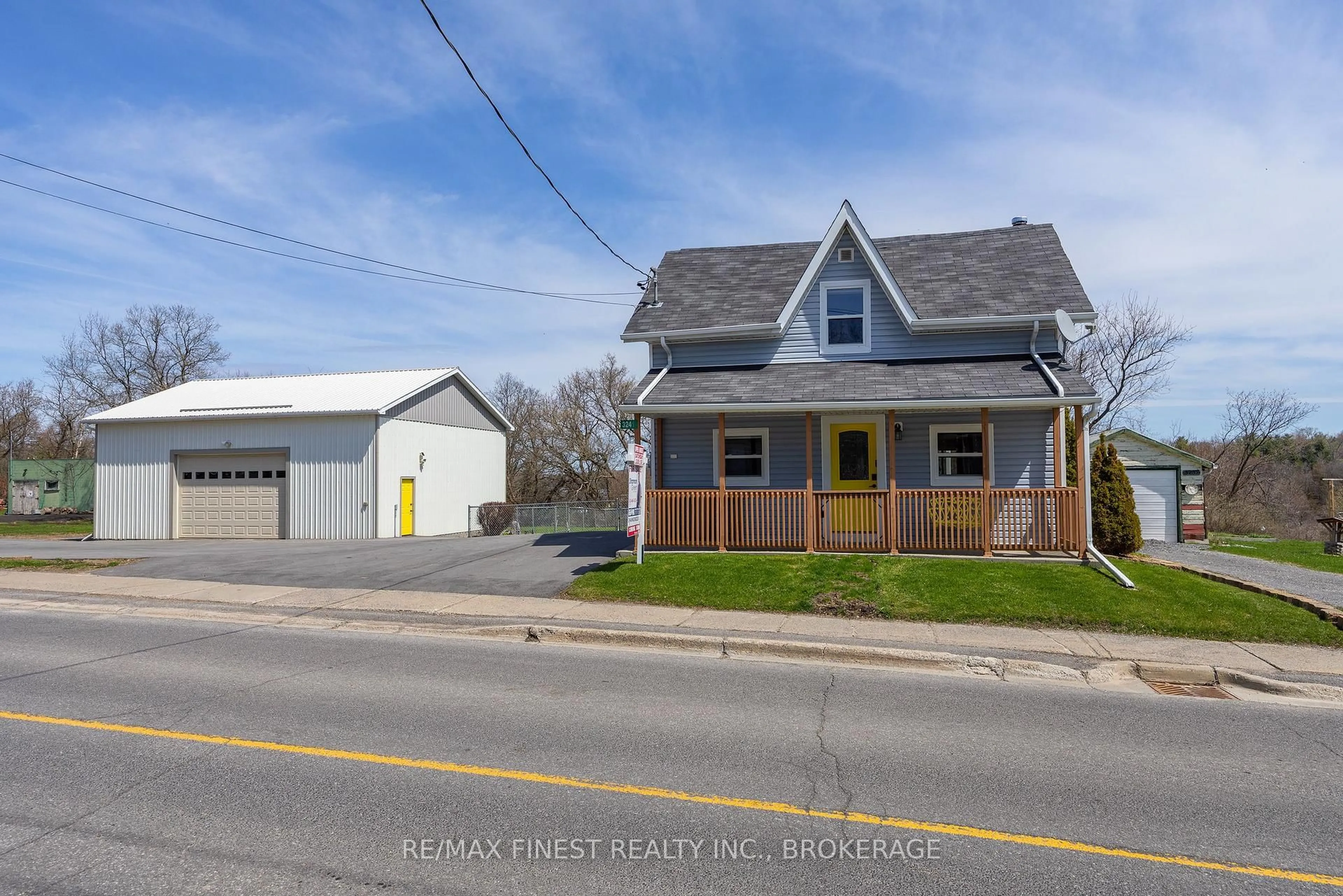 A pic from outside/outdoor area/front of a property/back of a property/a pic from drone, street for 3241 County Rd 6, Yarker Ontario K0K 3N0