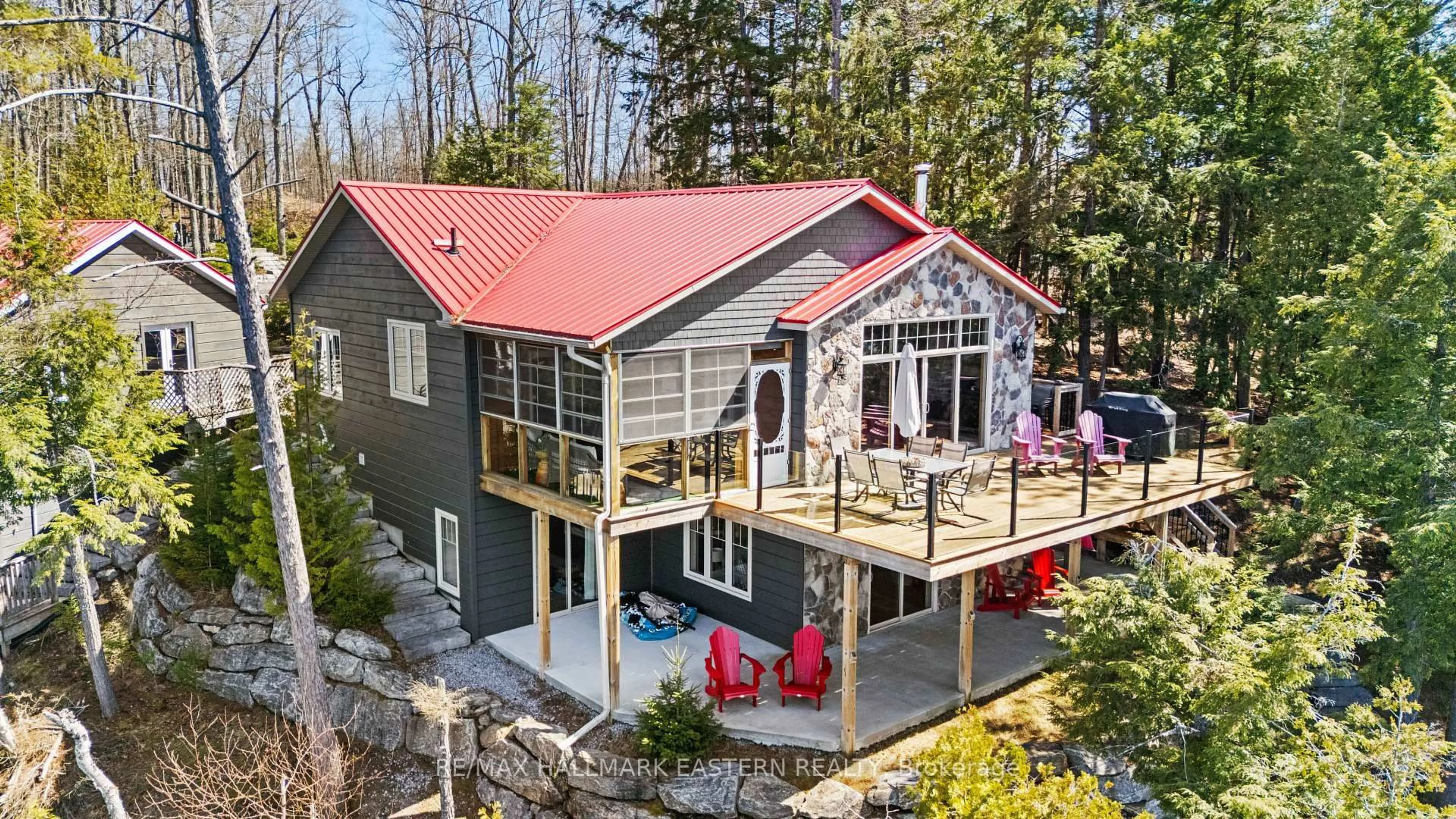 A pic from outside/outdoor area/front of a property/back of a property/a pic from drone, unknown for 66 Fire Route 209, Trent Lakes Ontario K0L 1J0