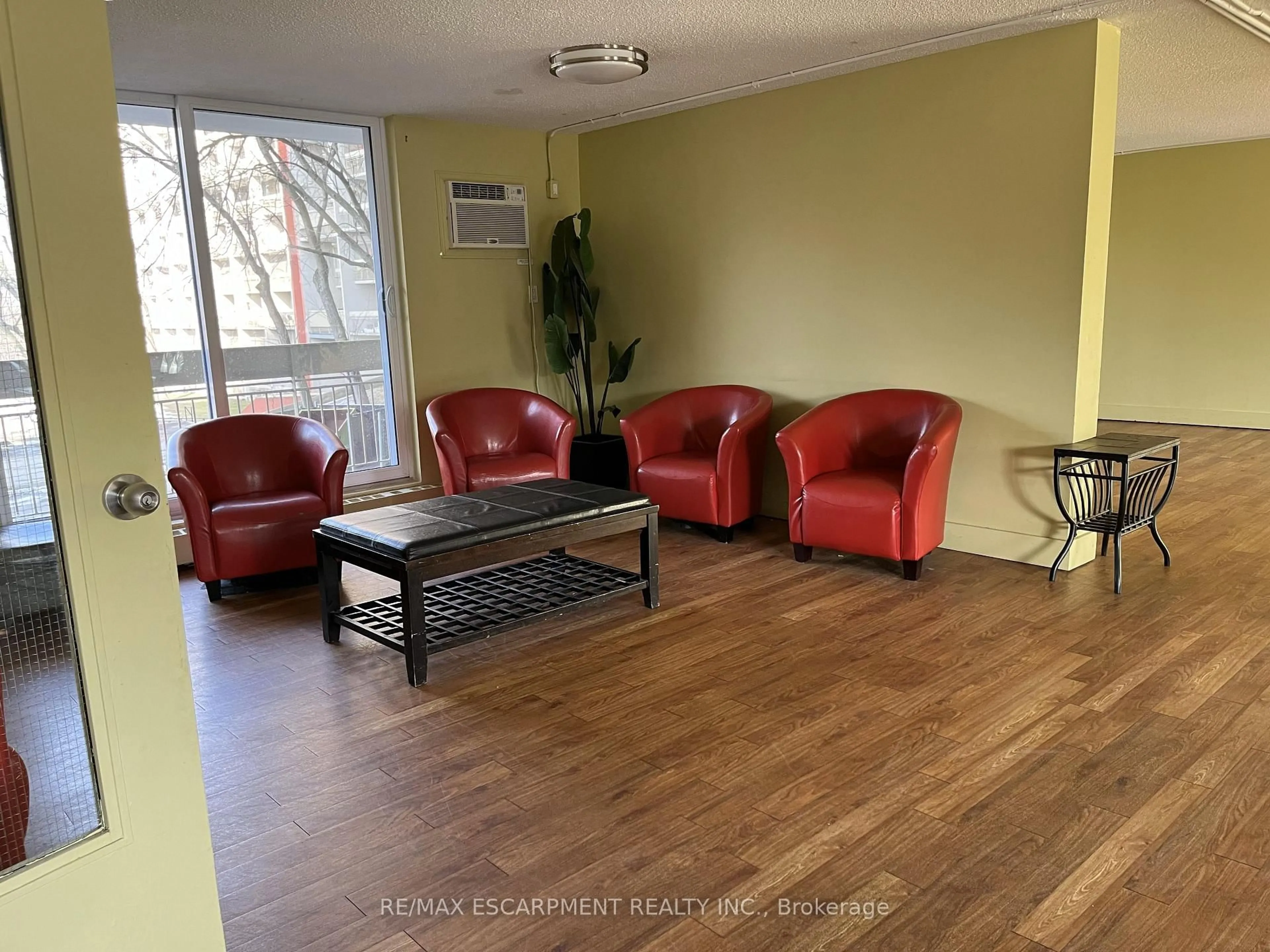 Living room with furniture, unknown for 350 Quigley Rd #147, Hamilton Ontario L8K 5N2