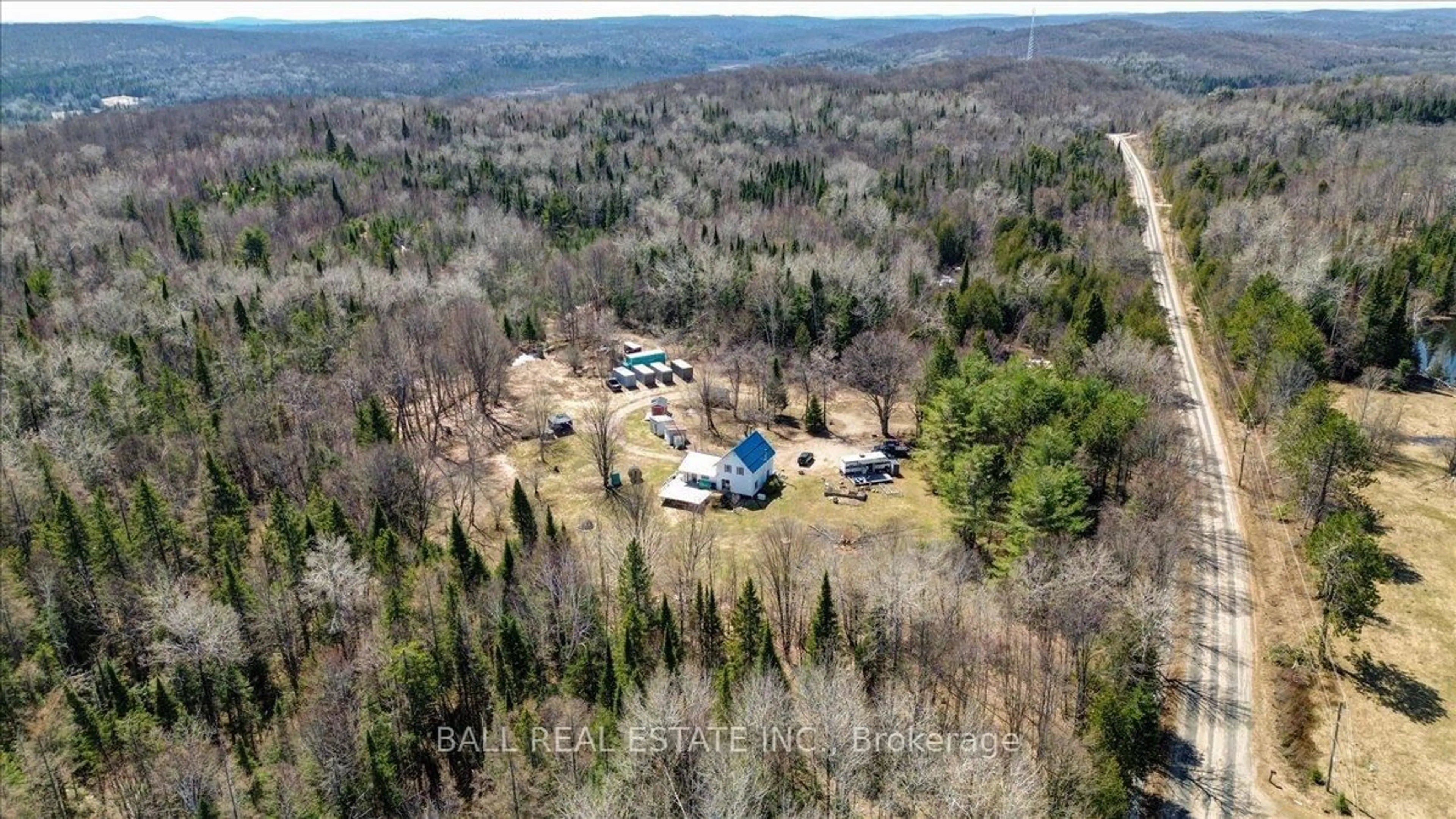 A pic from outside/outdoor area/front of a property/back of a property/a pic from drone, forest/trees view for 1230 Ojibway Rd, Highlands East Ontario K0L 2A0