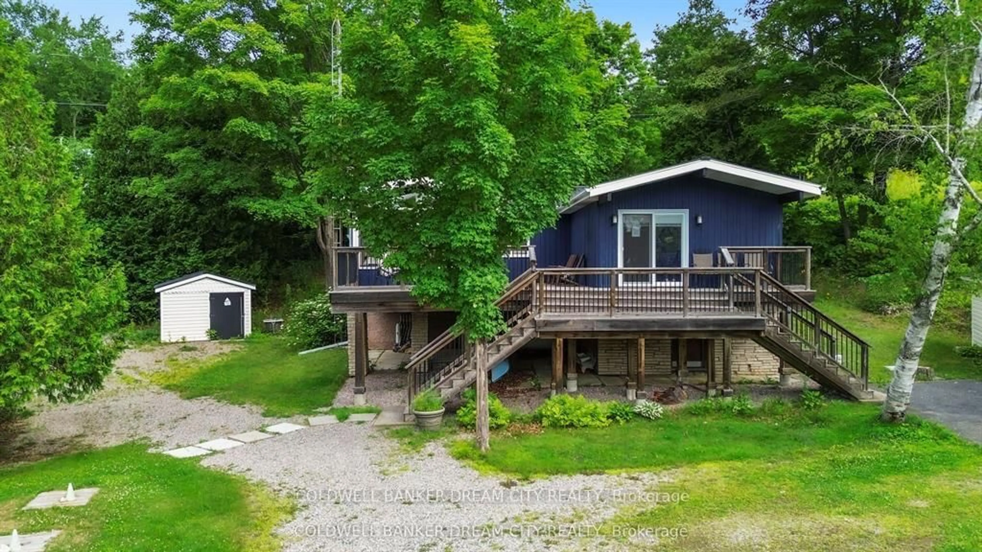 A pic from outside/outdoor area/front of a property/back of a property/a pic from drone, water/lake/river/ocean view for 1004A ALMOND Lane, Arden Ontario K0H 1B0