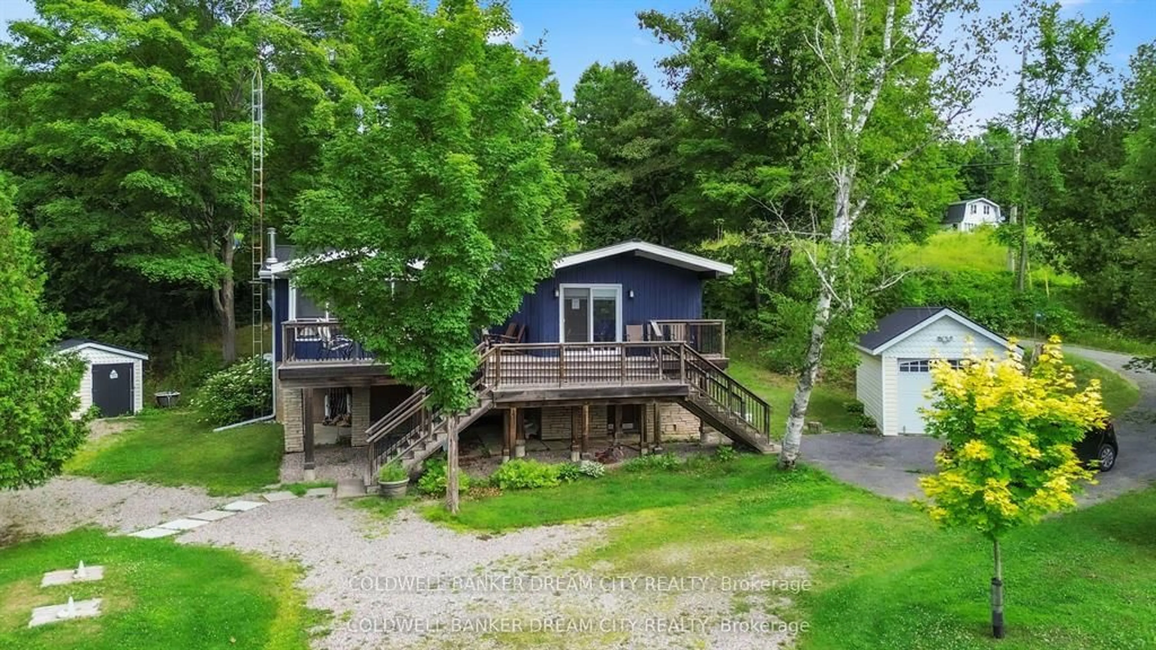 A pic from outside/outdoor area/front of a property/back of a property/a pic from drone, water/lake/river/ocean view for 1004A ALMOND Lane, Arden Ontario K0H 1B0