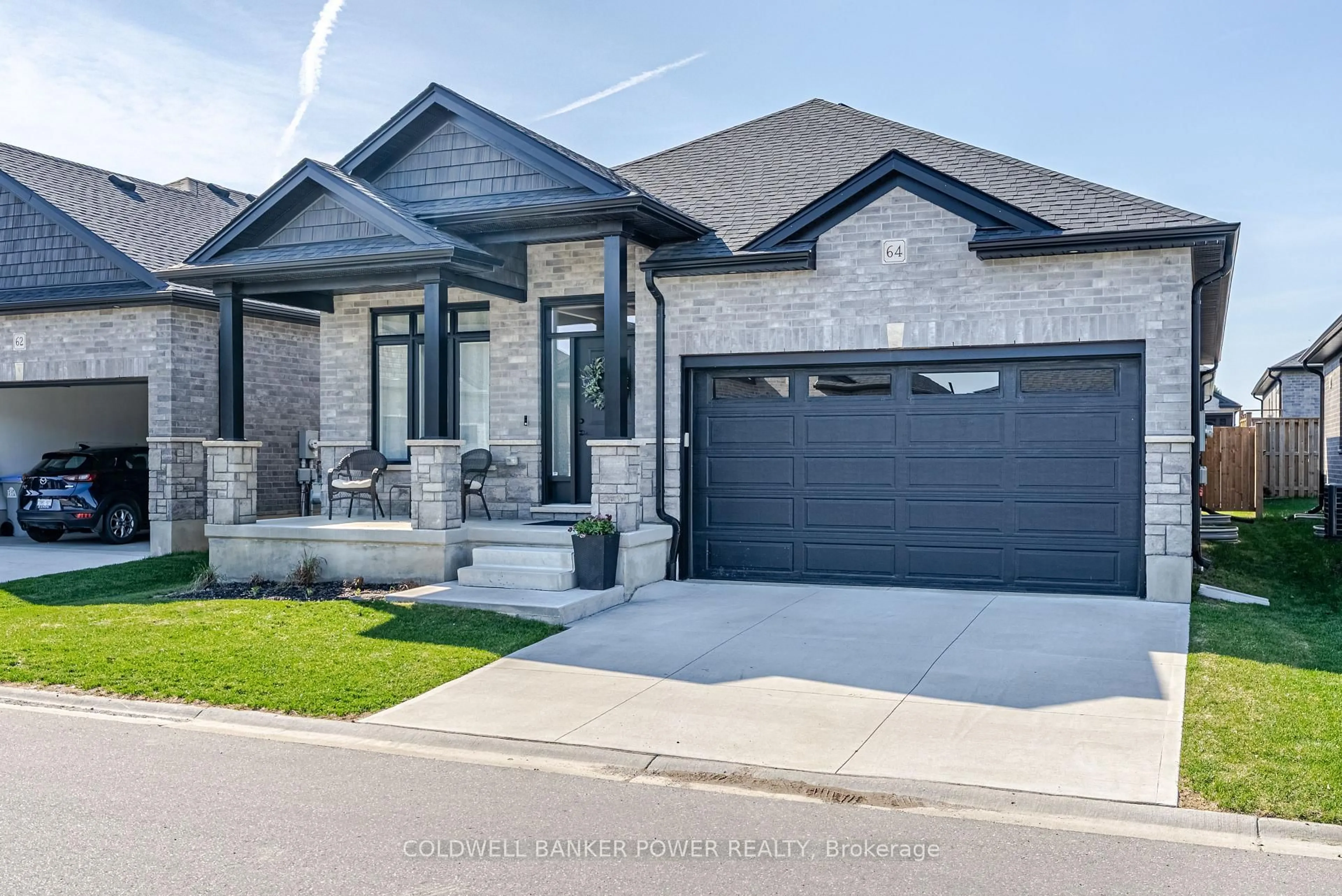 Home with brick exterior material, street for 383 Daventry Way #64, Middlesex Centre Ontario N0L 1R0