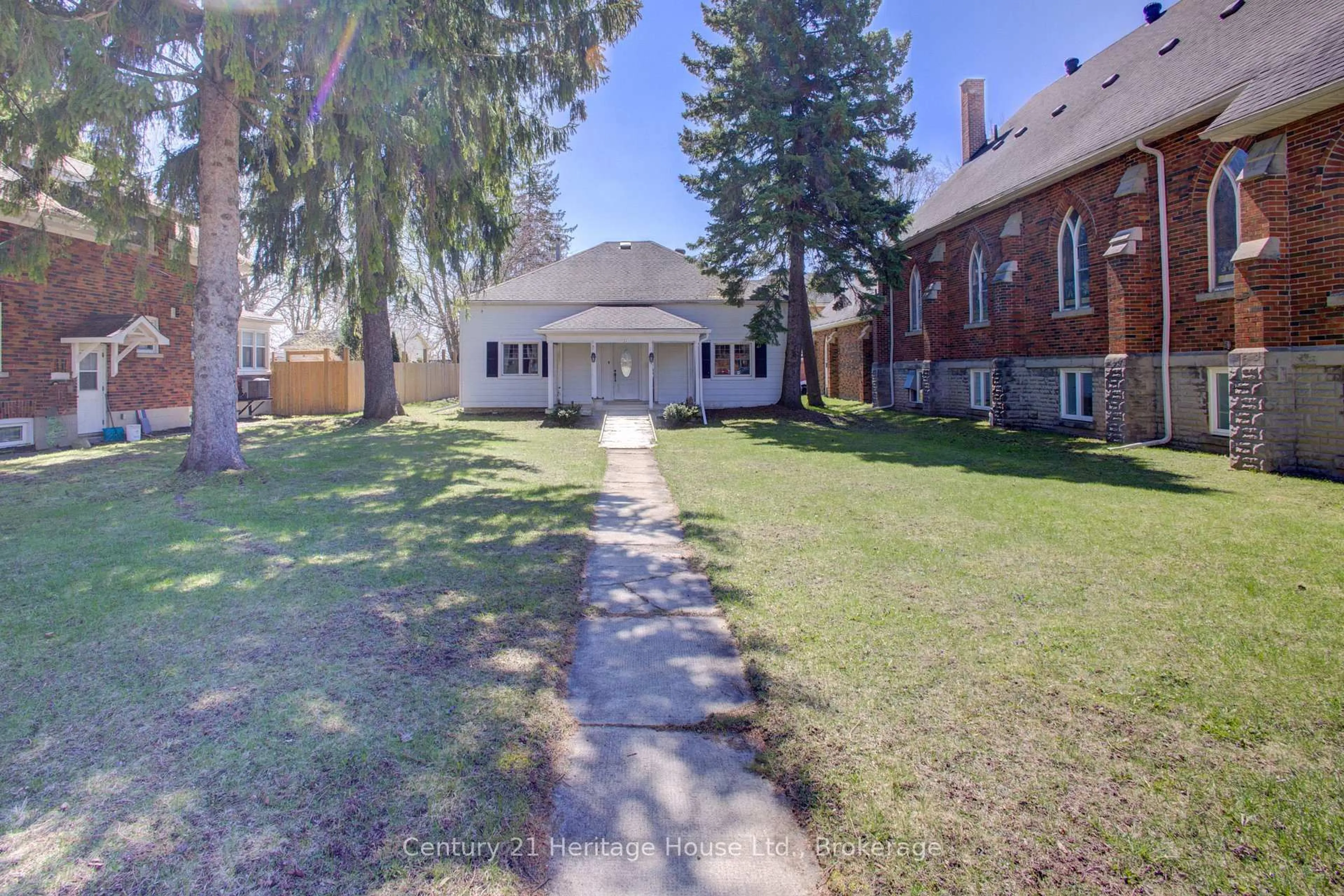 A pic from outside/outdoor area/front of a property/back of a property/a pic from drone, street for 221 Lambton St, West Grey Ontario N0G 1R0