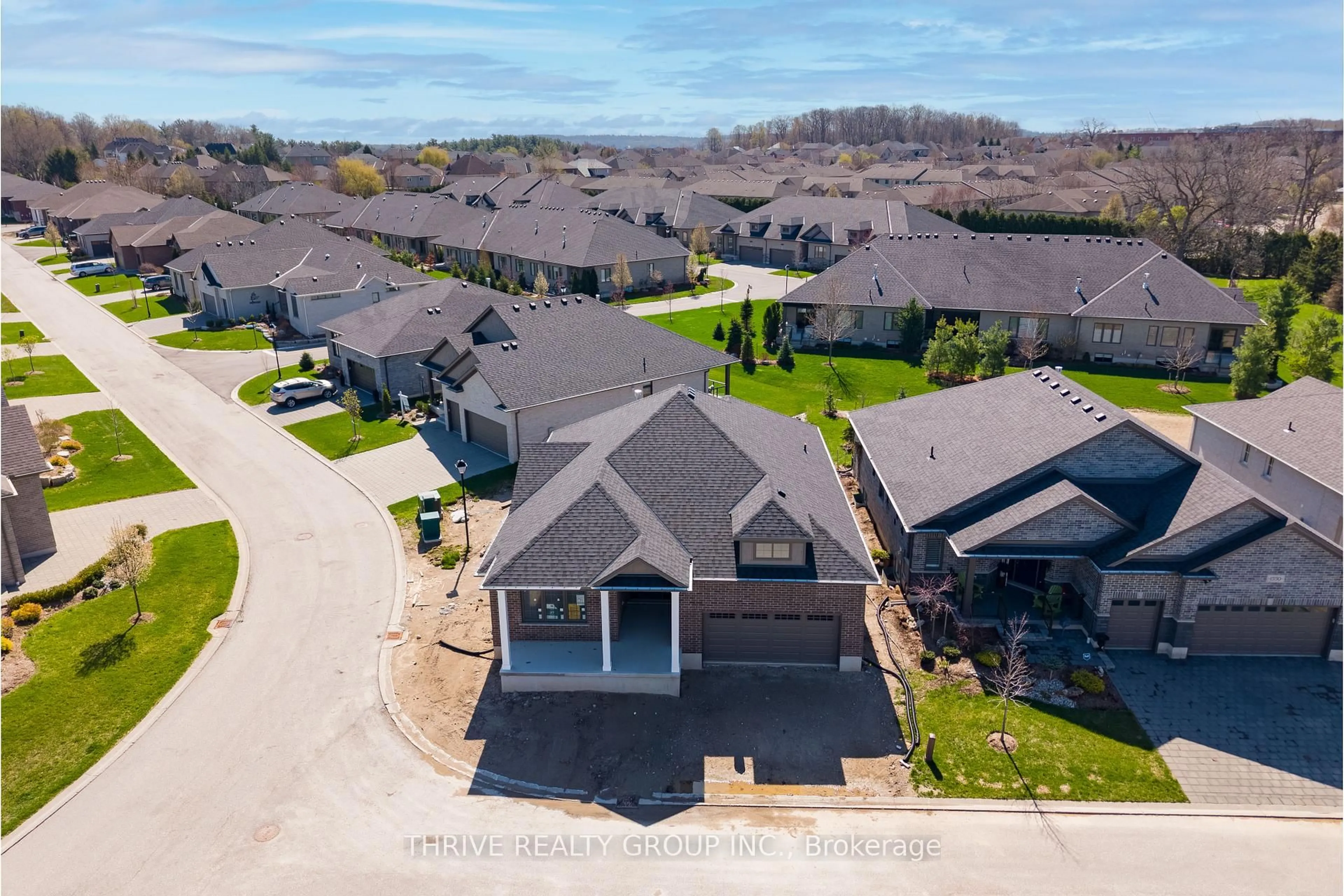 A pic from outside/outdoor area/front of a property/back of a property/a pic from drone, unknown for 1558 Ed Ervasti Lane, London South Ontario N6K 5R7
