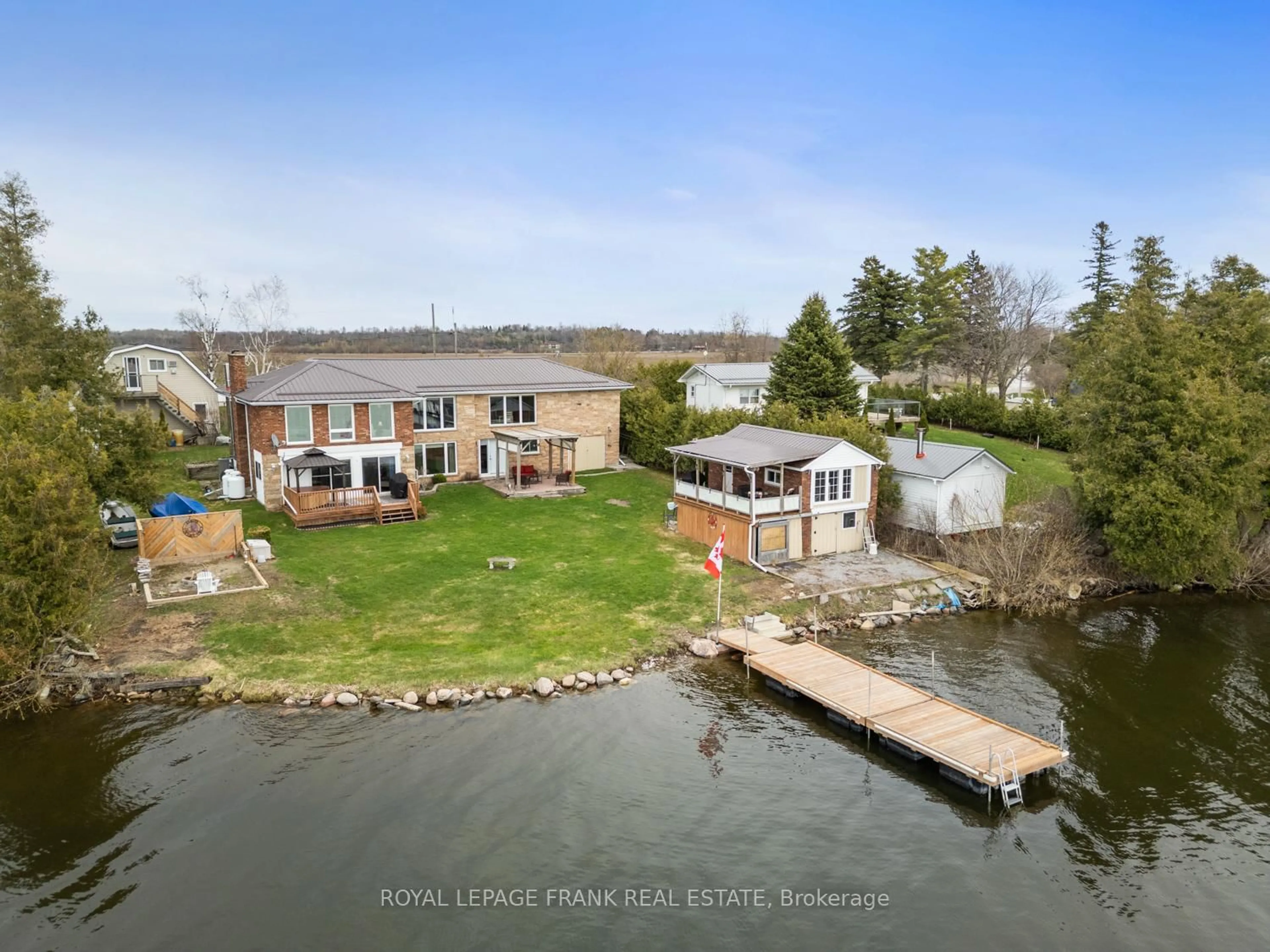 A pic from outside/outdoor area/front of a property/back of a property/a pic from drone, water/lake/river/ocean view for 106 Starr Blvd, Kawartha Lakes Ontario K0M 2C0