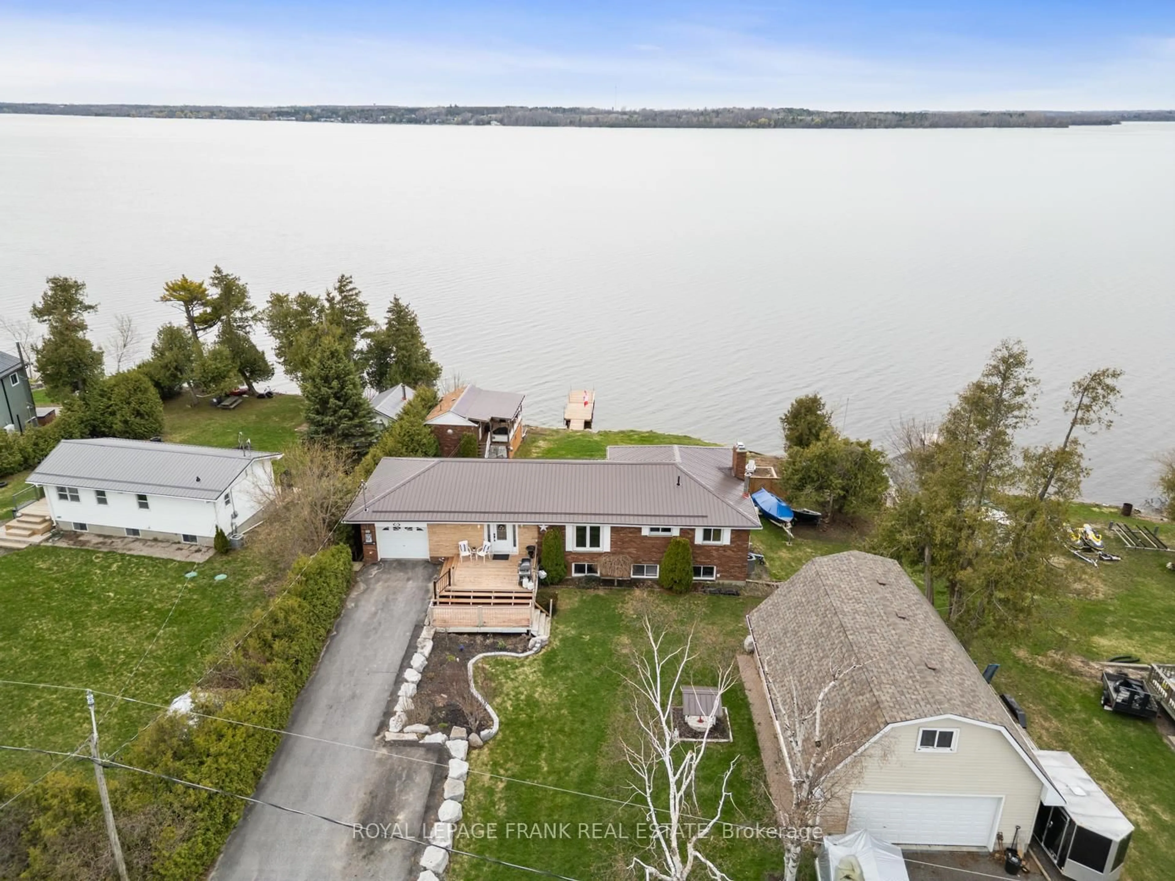 A pic from outside/outdoor area/front of a property/back of a property/a pic from drone, water/lake/river/ocean view for 106 Starr Blvd, Kawartha Lakes Ontario K0M 2C0
