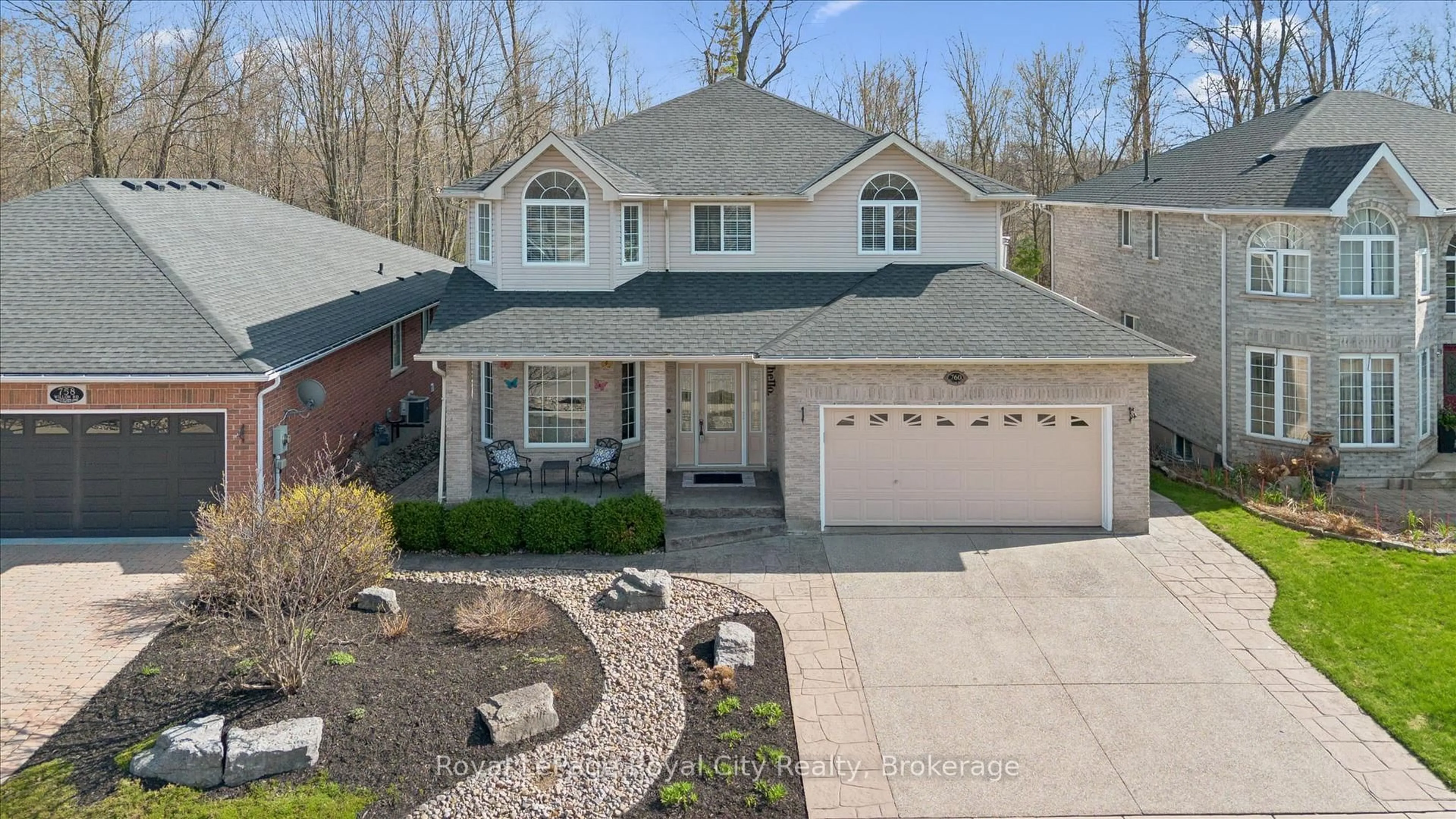 Home with vinyl exterior material, street for 760 Willow Rd, Guelph Ontario N1K 1Z2