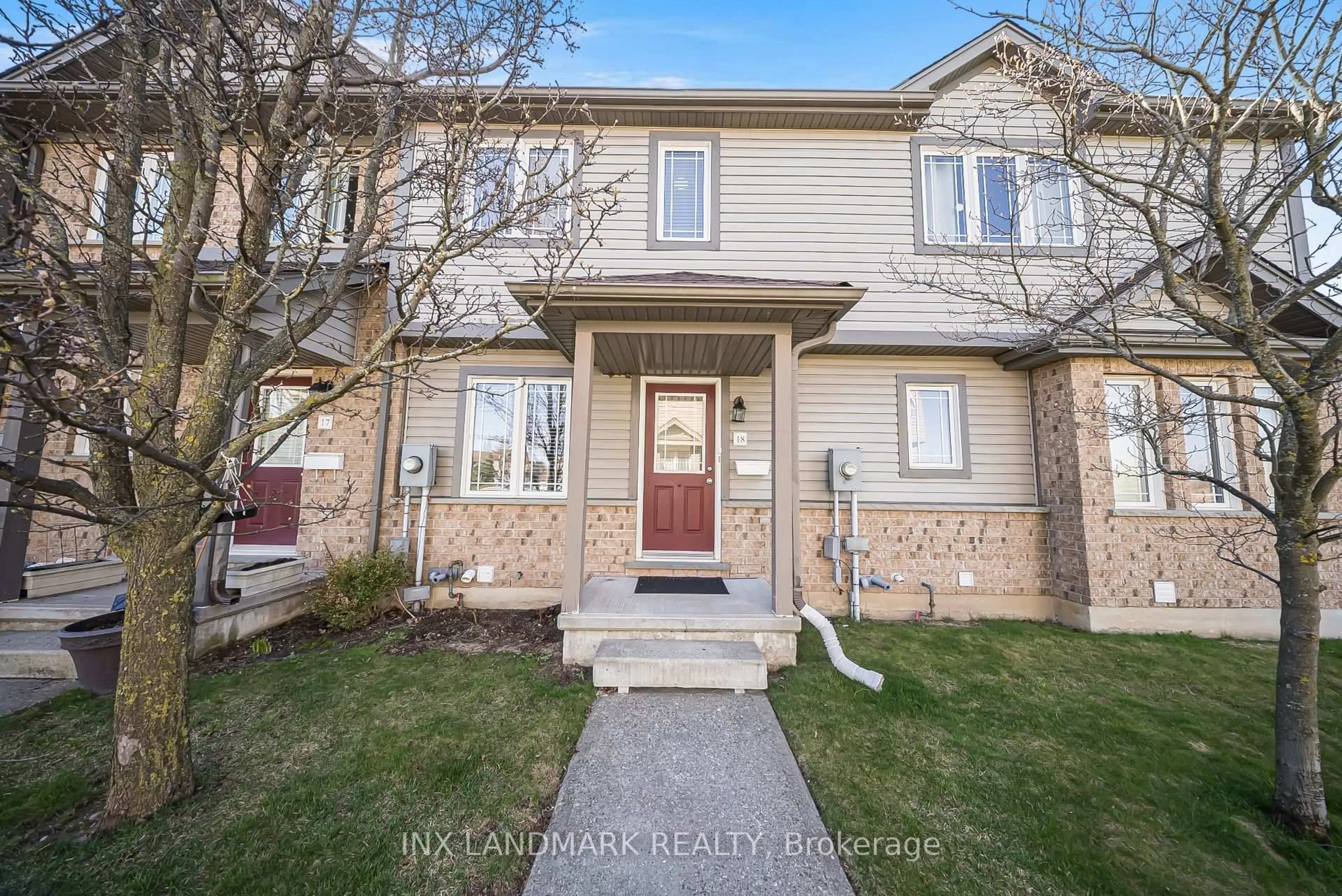 Home with brick exterior material, street for 535 Windflower Cres #18, Kitchener Ontario N2E 4L7