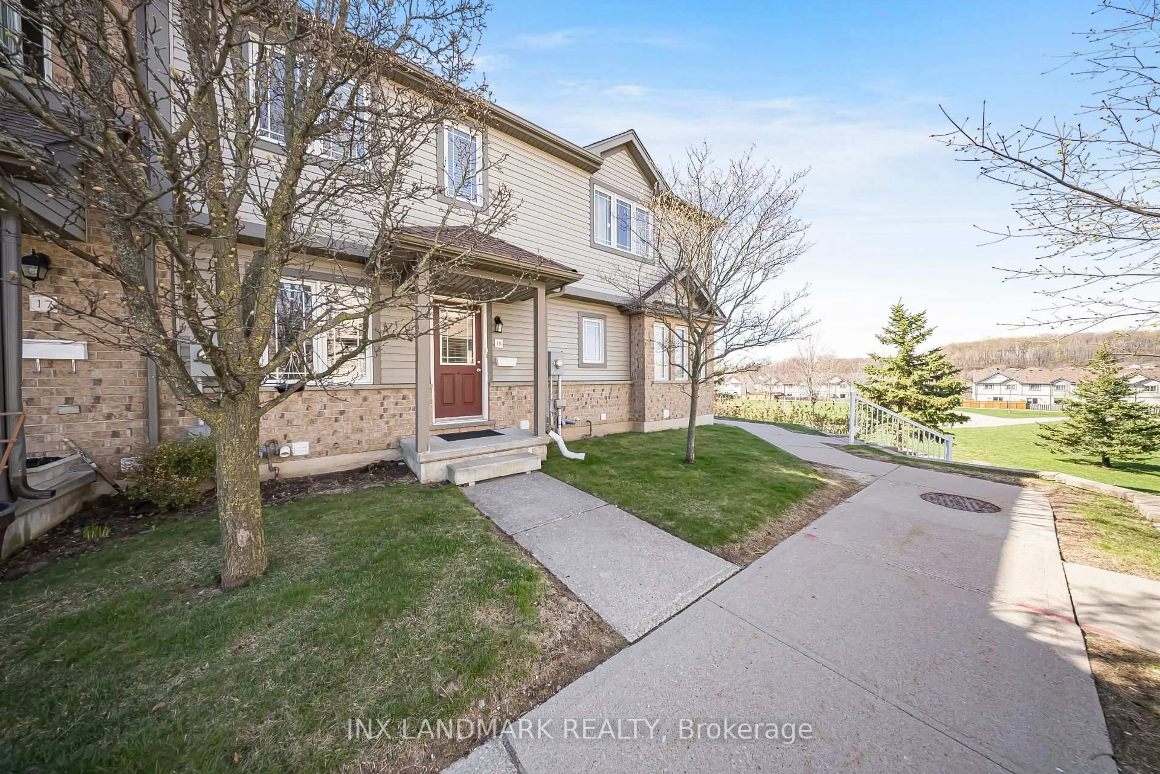 A pic from outside/outdoor area/front of a property/back of a property/a pic from drone, street for 535 Windflower Cres #18, Kitchener Ontario N2E 4L7