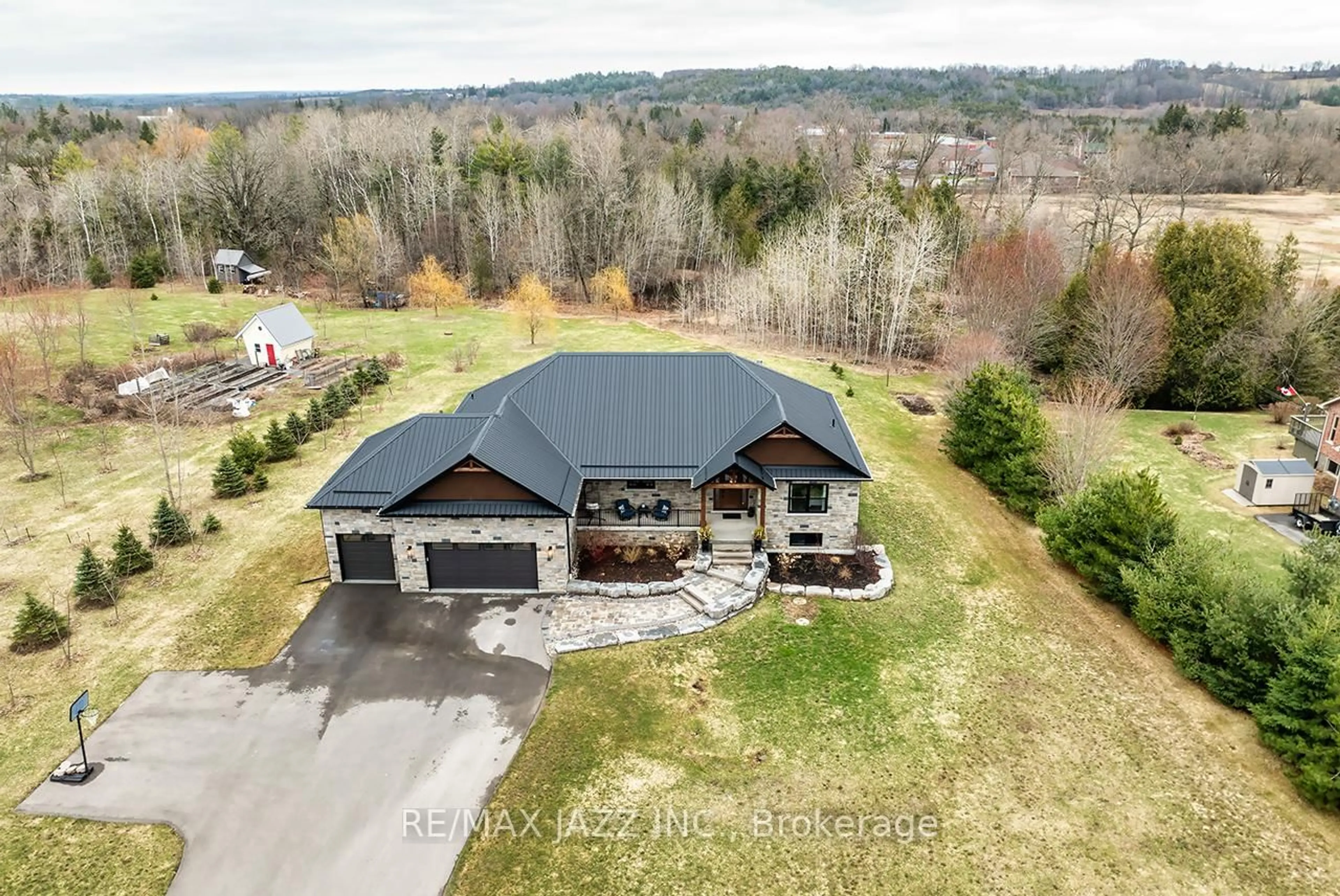 A pic from outside/outdoor area/front of a property/back of a property/a pic from drone, unknown for 32 Huston St, Cavan Monaghan Ontario L0A 1G0