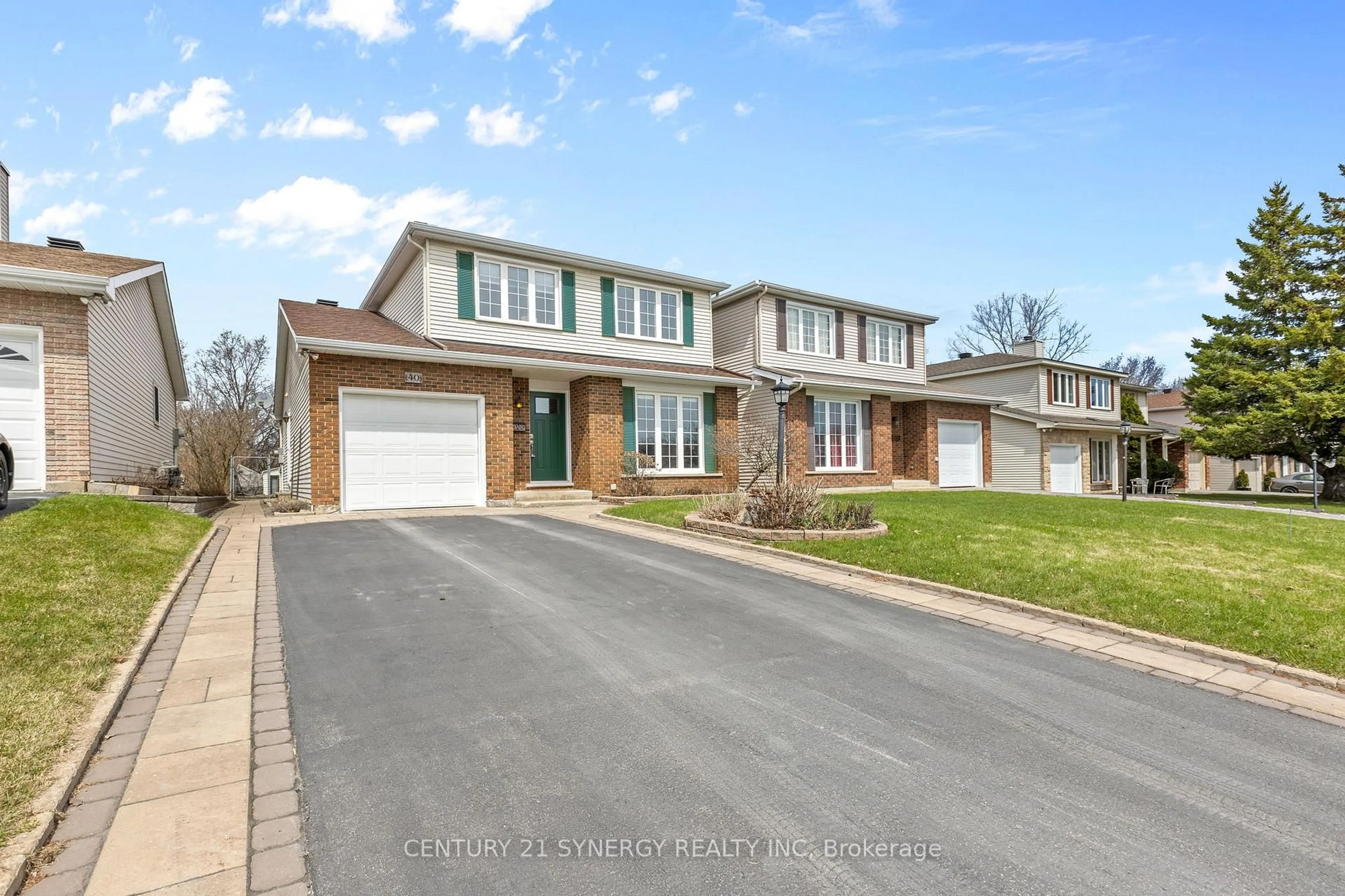 Home with brick exterior material, street for 40 Brockington Cres, Ottawa Ontario K2G 4K2