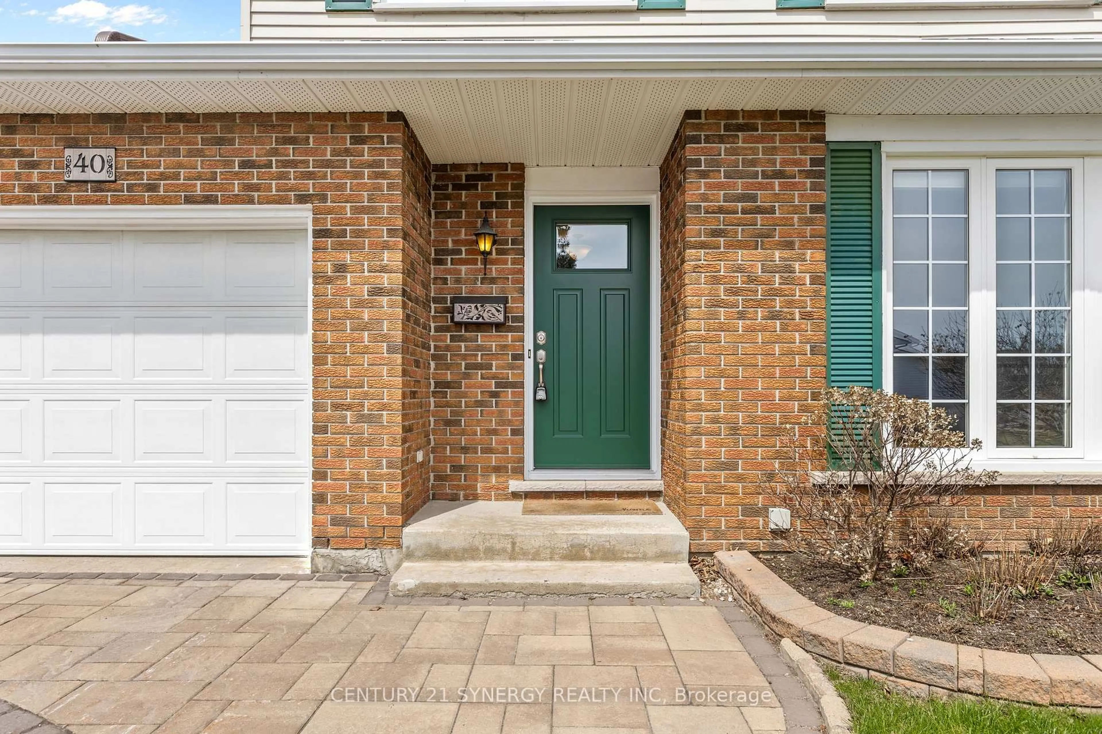 Home with brick exterior material, street for 40 Brockington Cres, Ottawa Ontario K2G 4K2